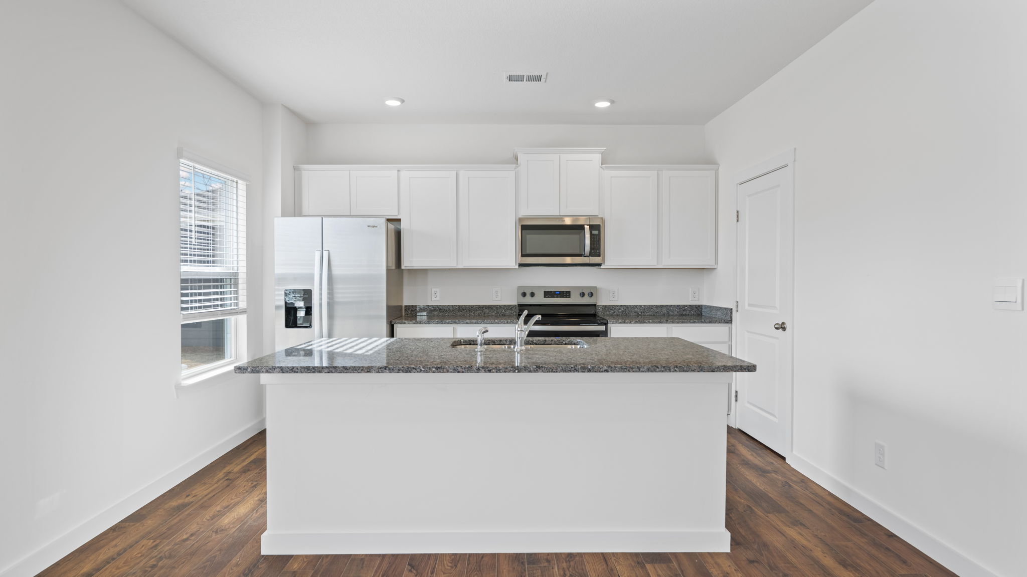 kitchen with large island and single window
