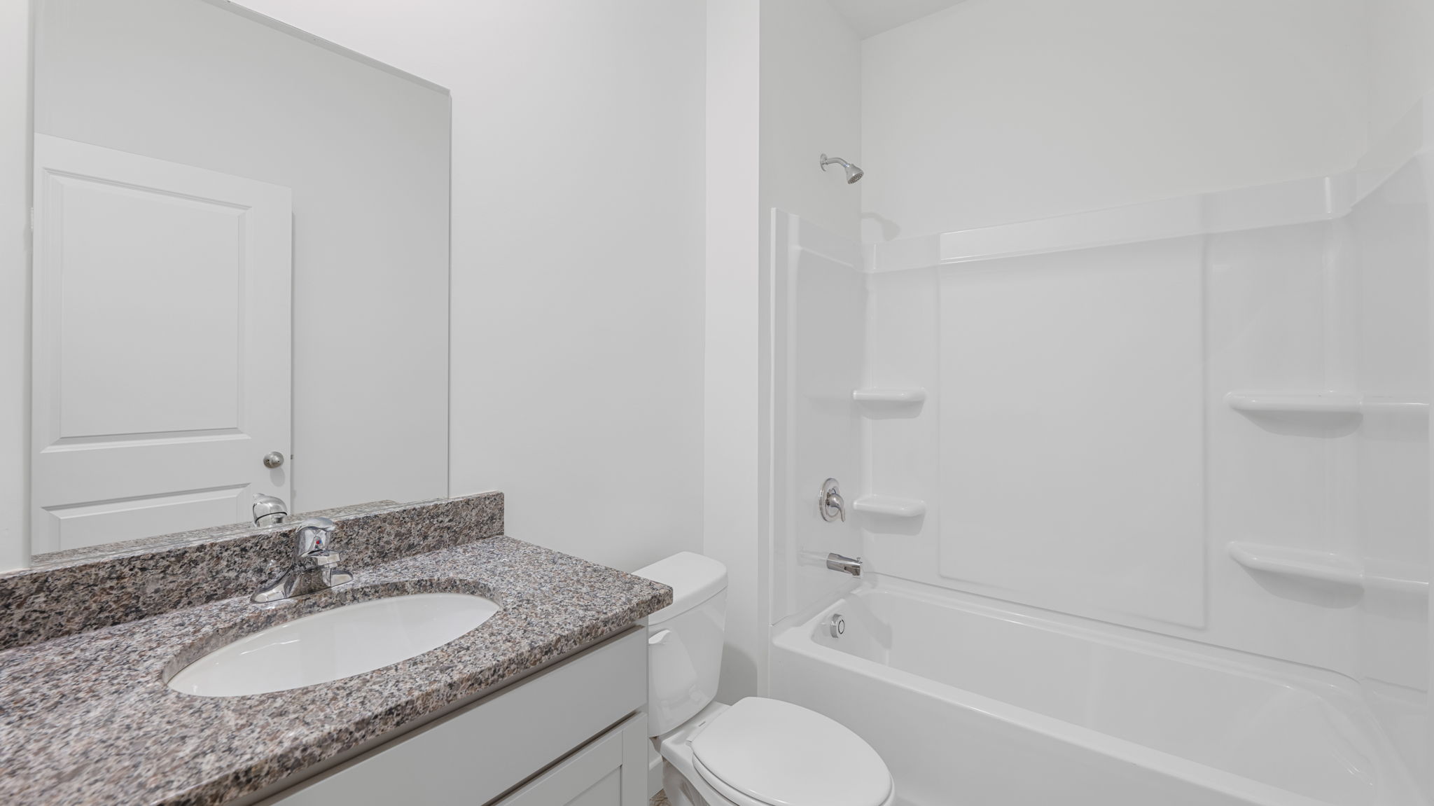 full bathroom with single vanity and shower/ tub duo