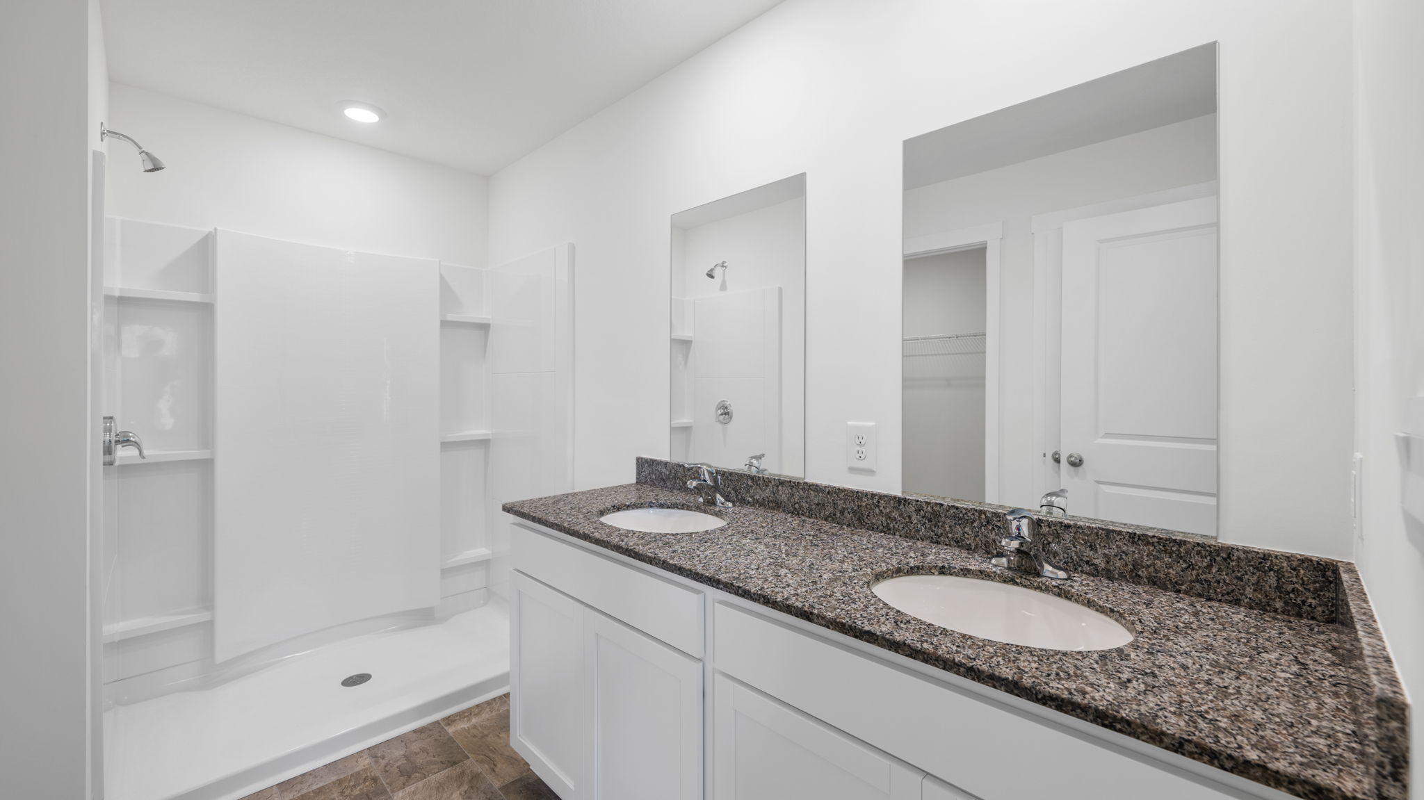 primary bathroom with double vanity