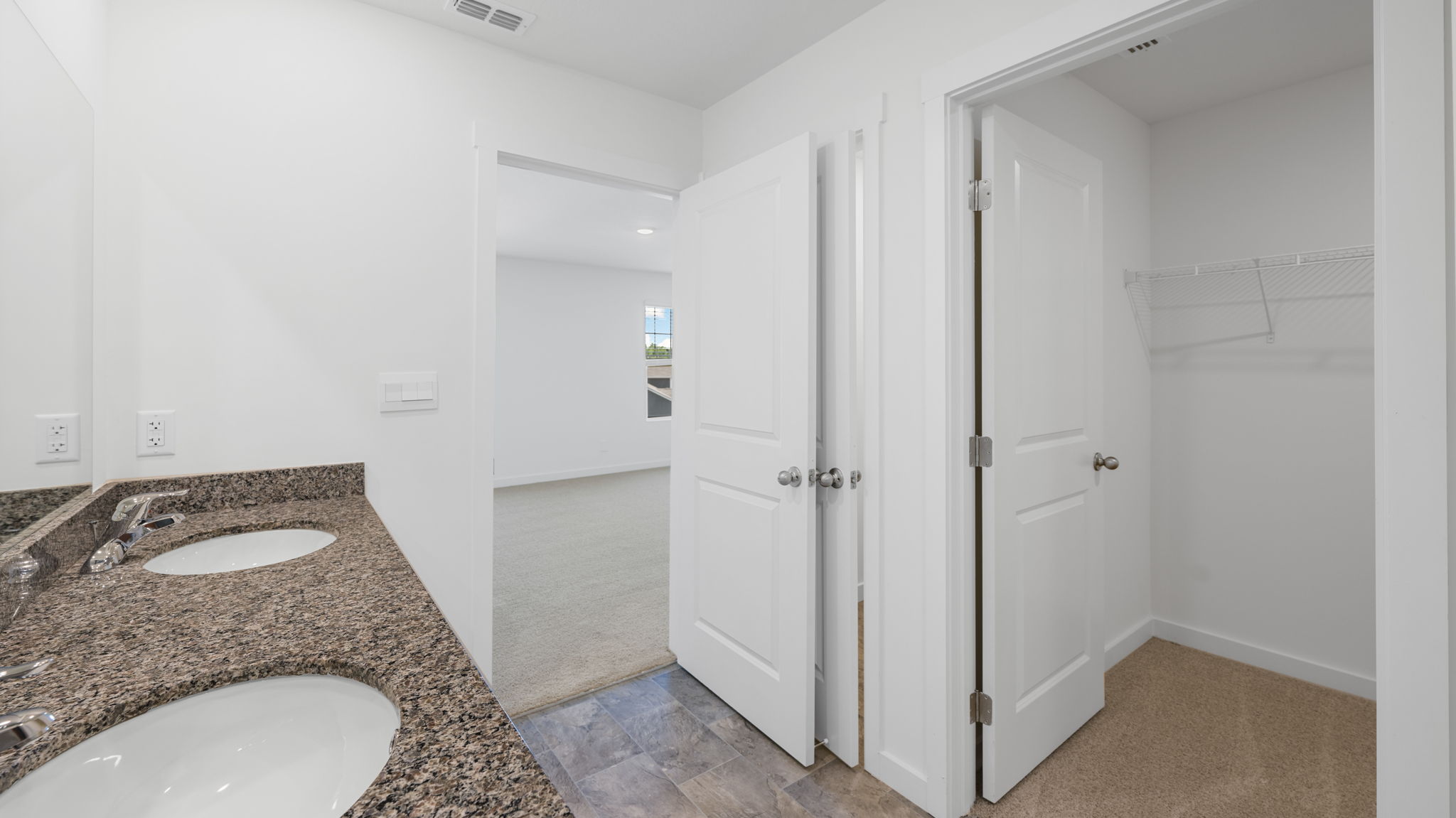 [primary bathroom with closet