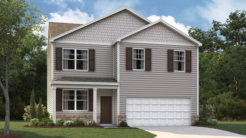 Two story home with two car garage and brick