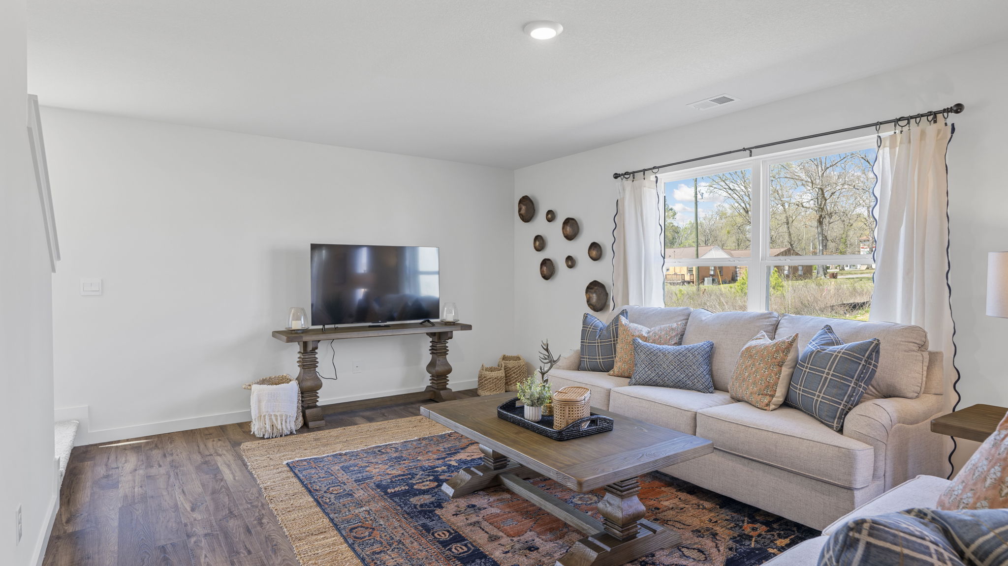 Living room off kitchen with double window