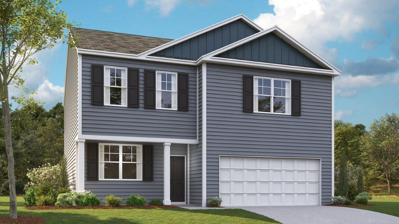 Two story home with vinyl and two car garage