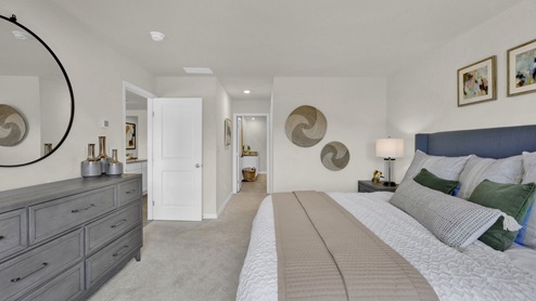 primary bedroom with carpet