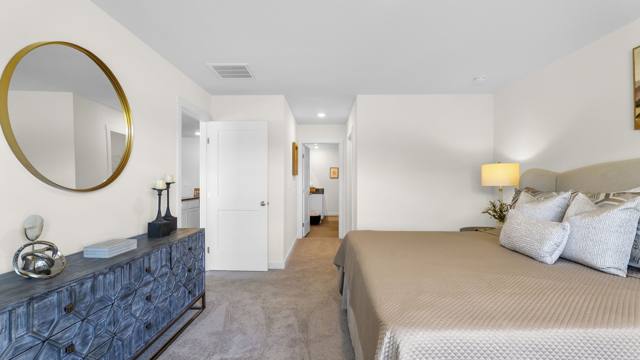 Primary bedroom with carpet