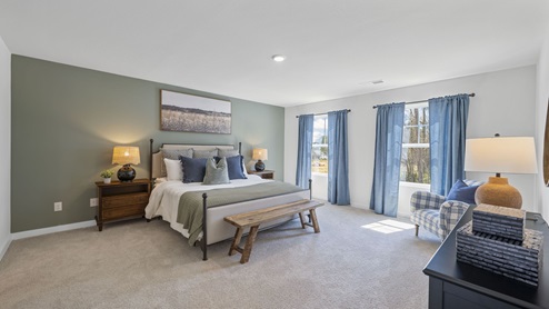 primary bedroom with carpet