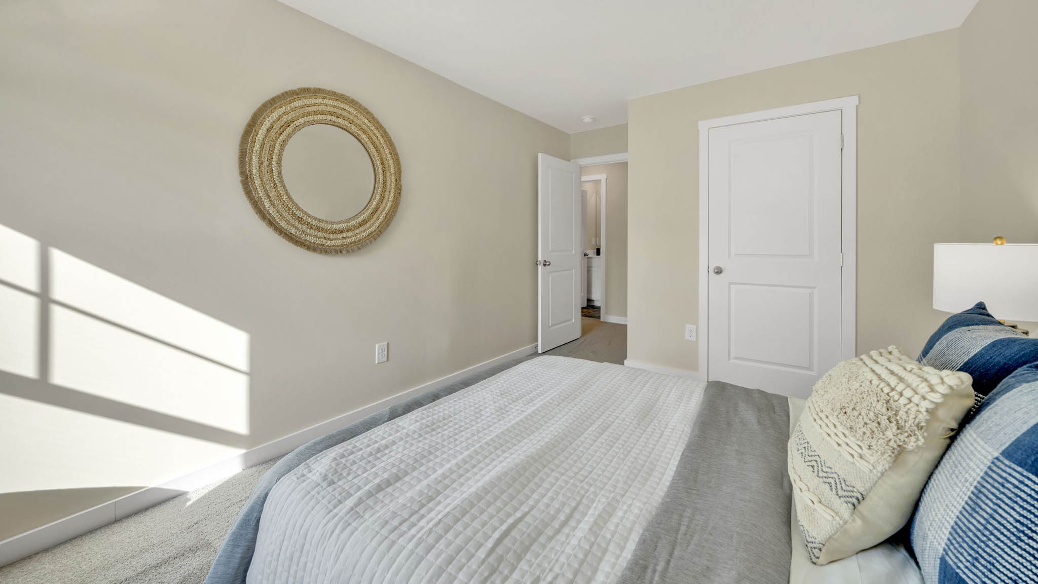 guest room with carpet and windows