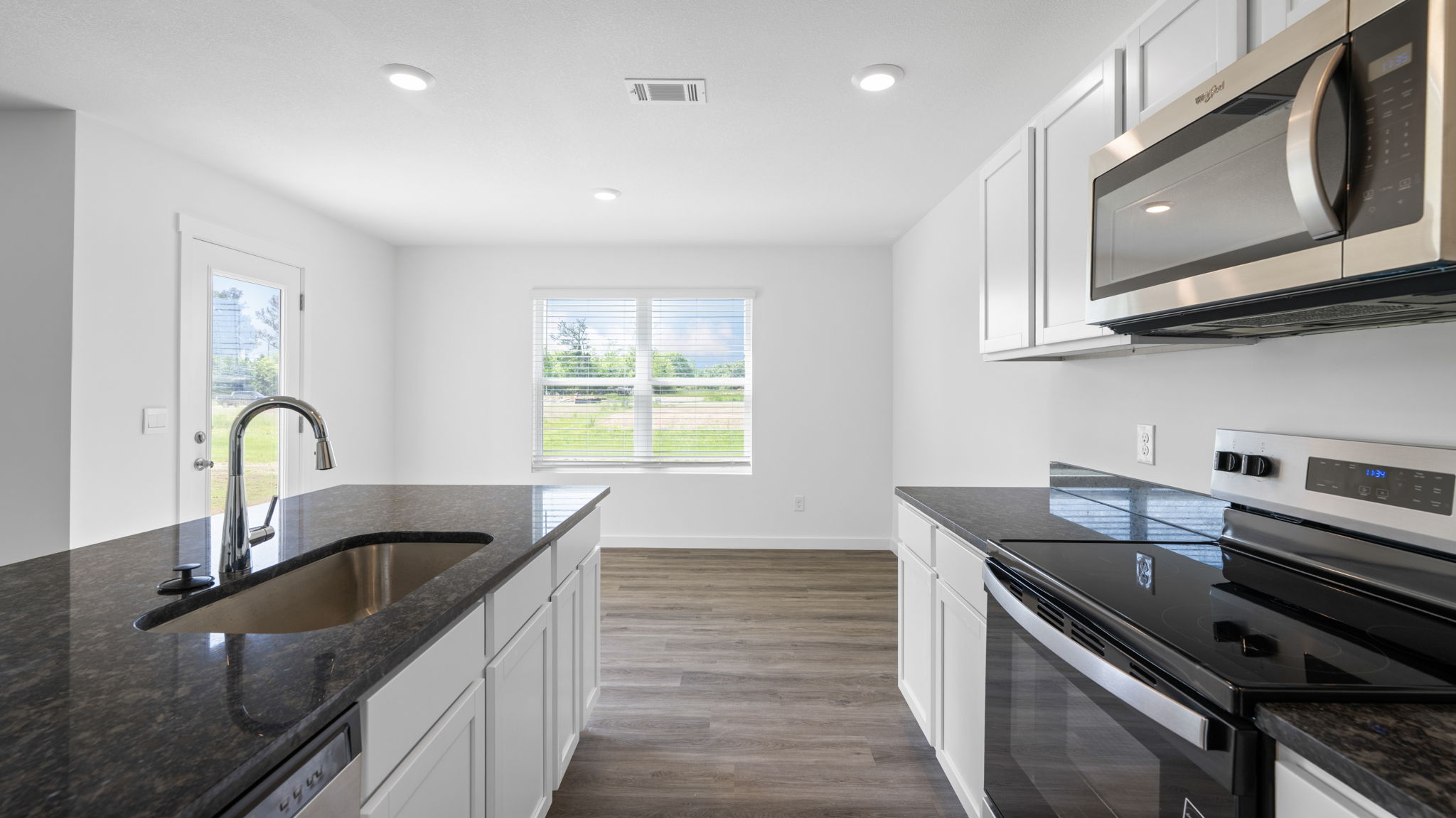 kitchen with large island and stainless steel appliances