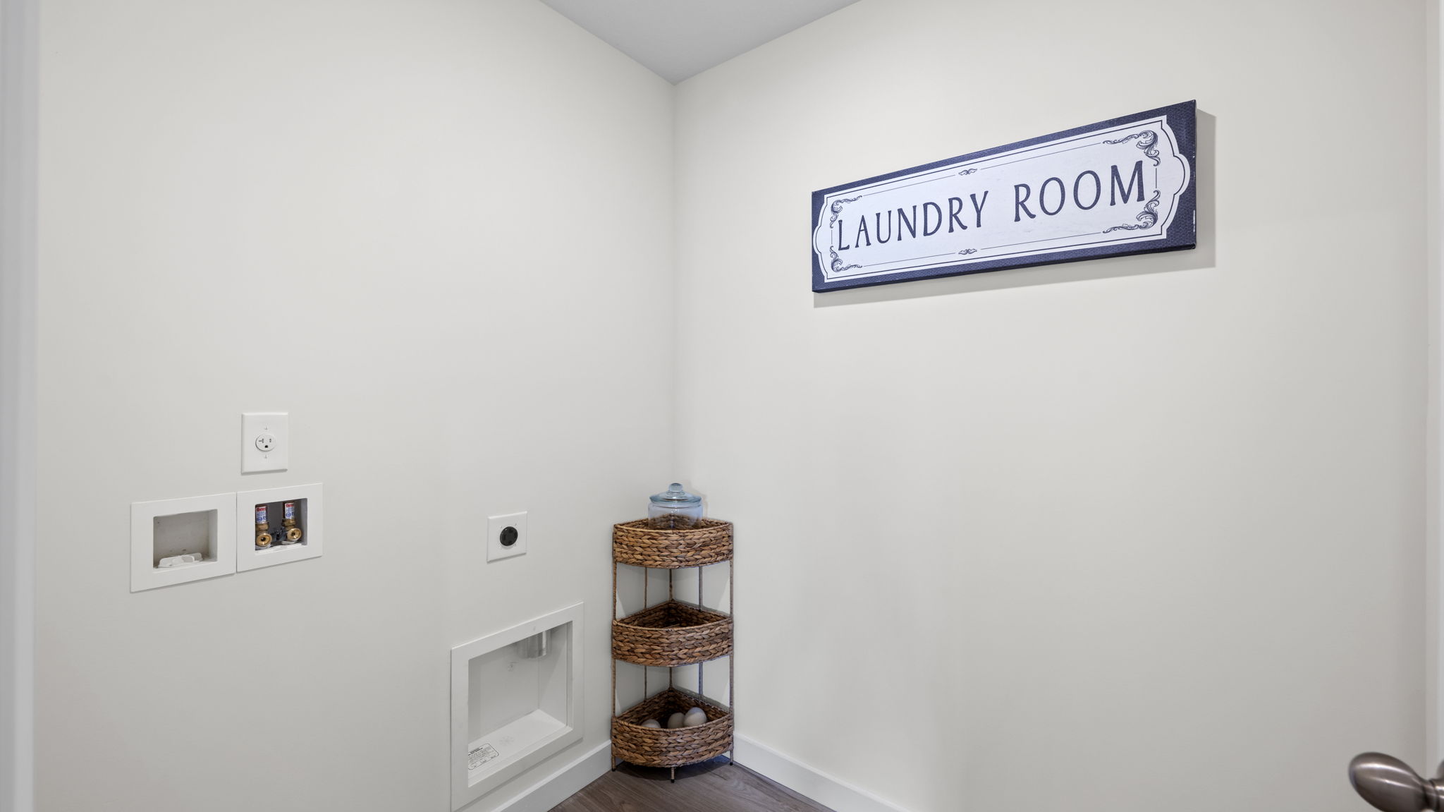 laundry room with shelving