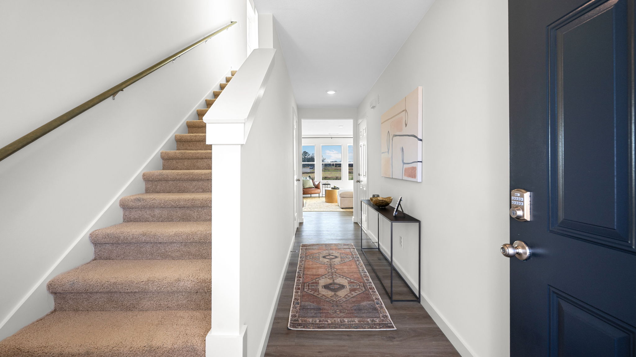 entryway hallway with stairs to the left