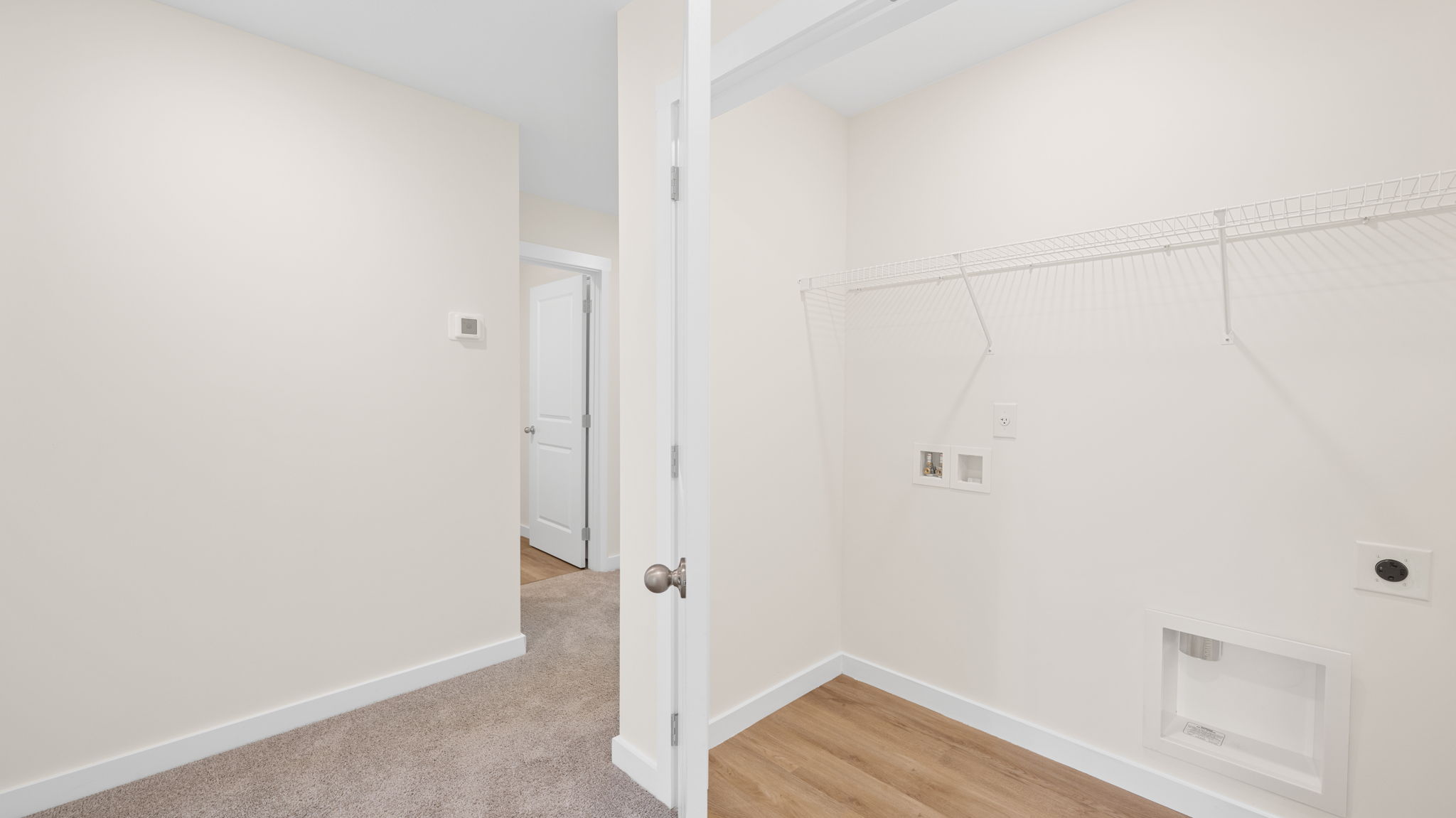 laundry room with shelving