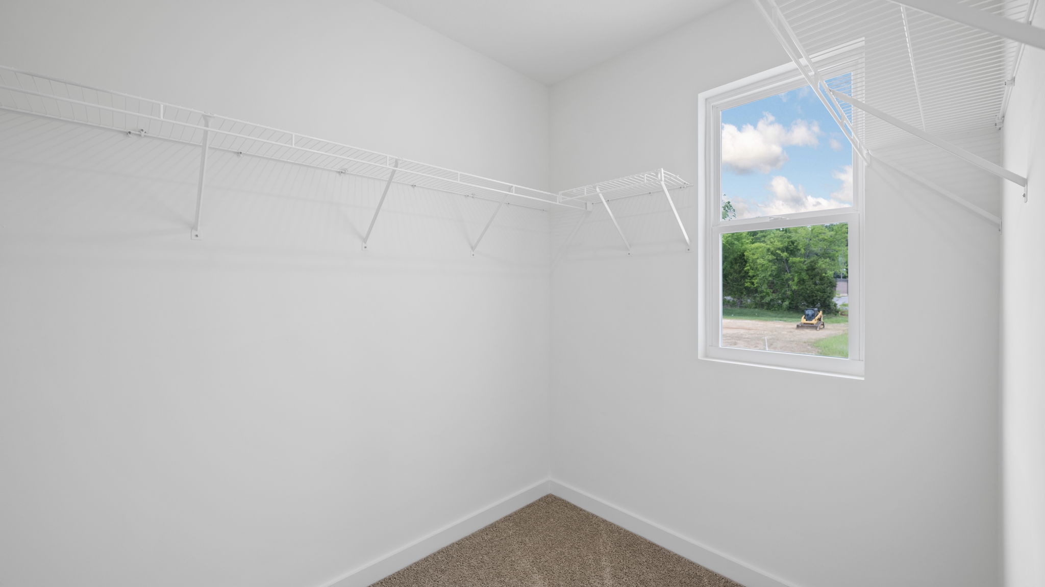 bedroom closet with window
