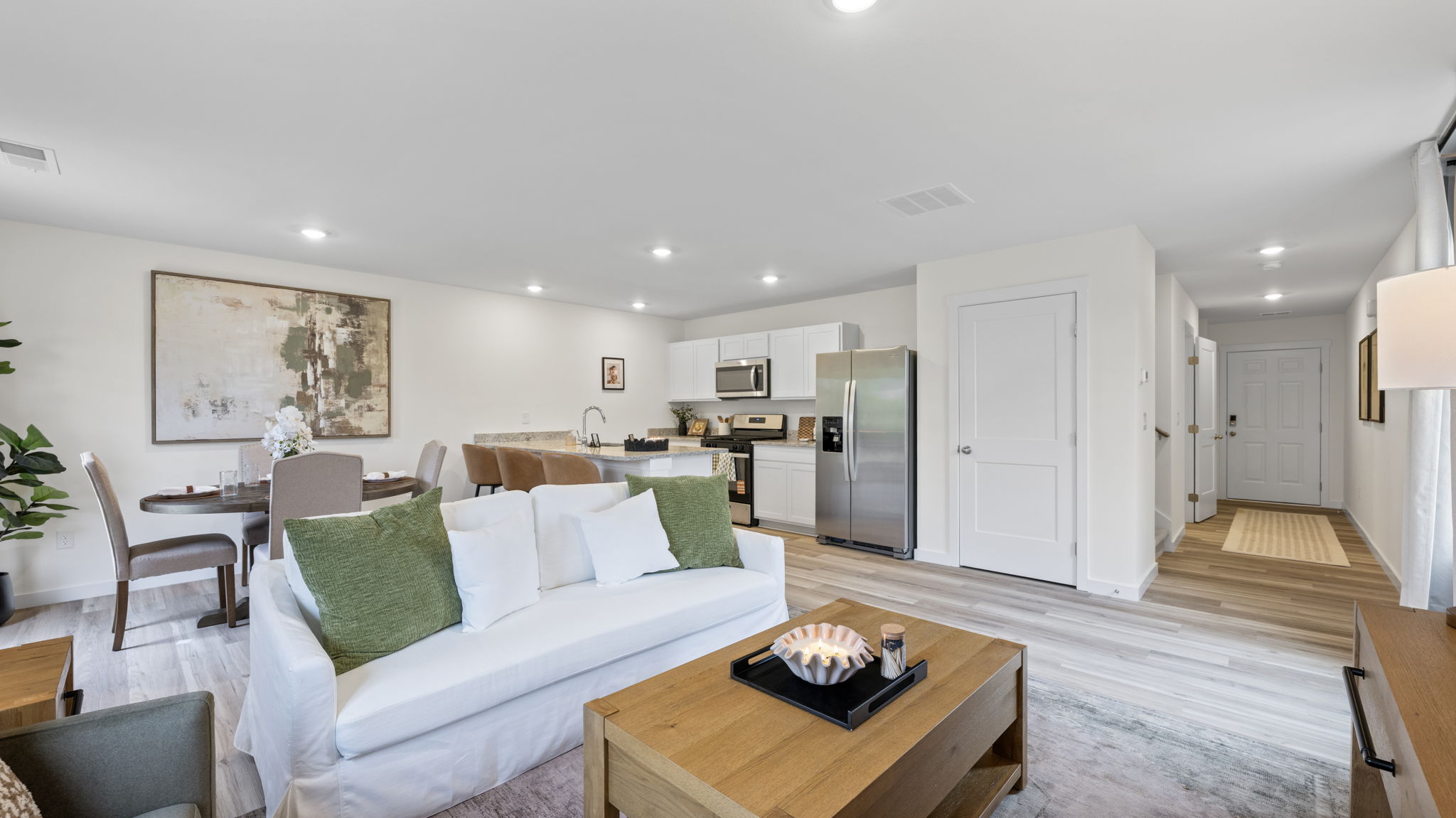 open concept living room with double window