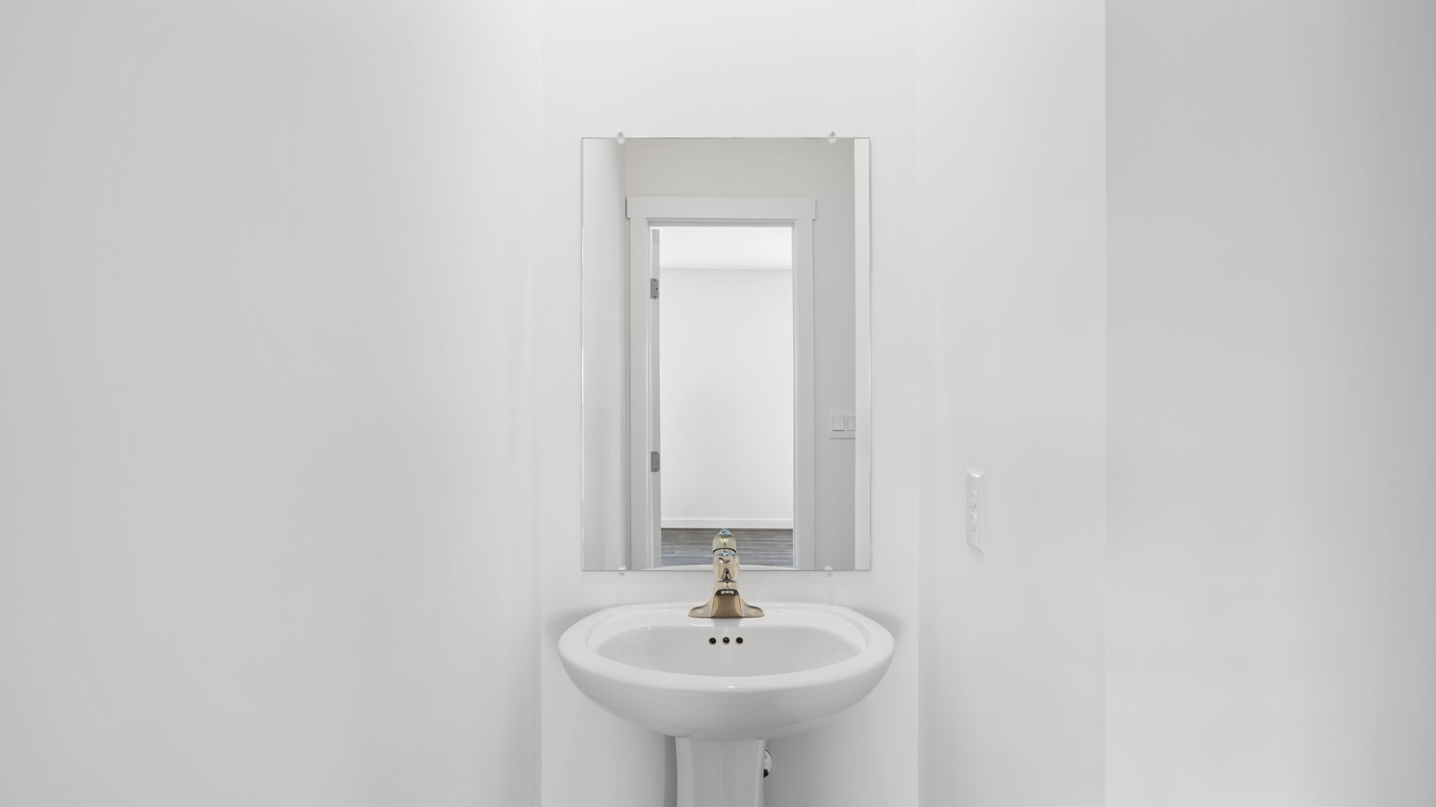 powder bath has sink and mirror