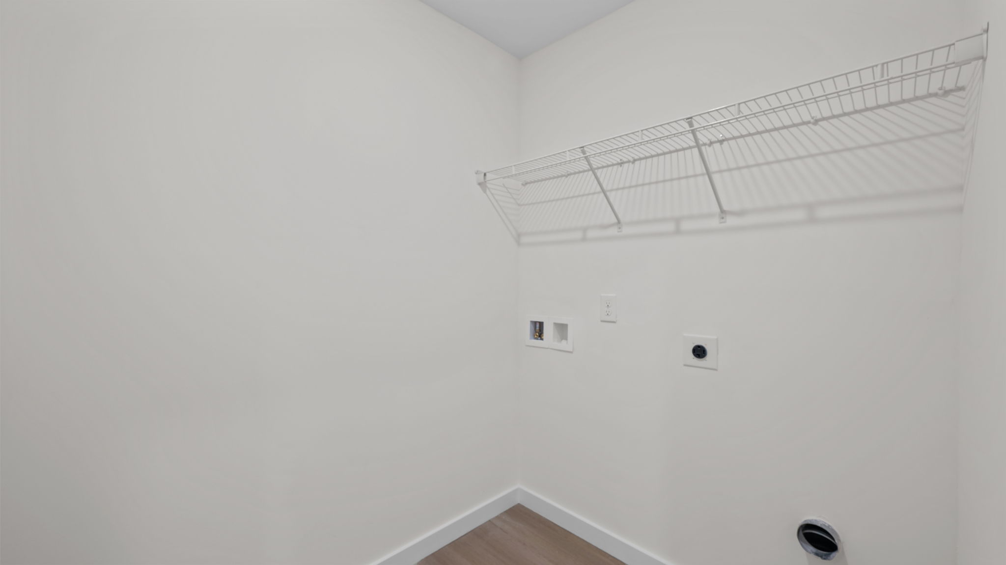 laundry room with shelf