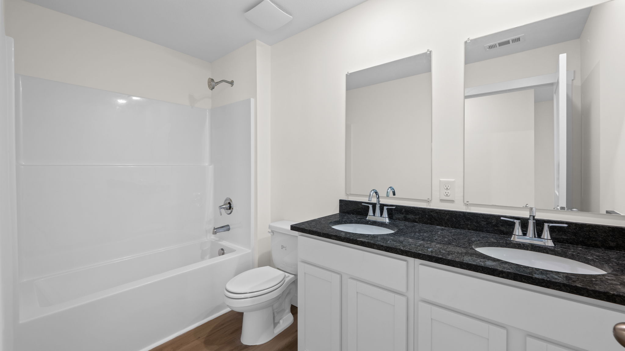 guest bathroom with double bowl sink