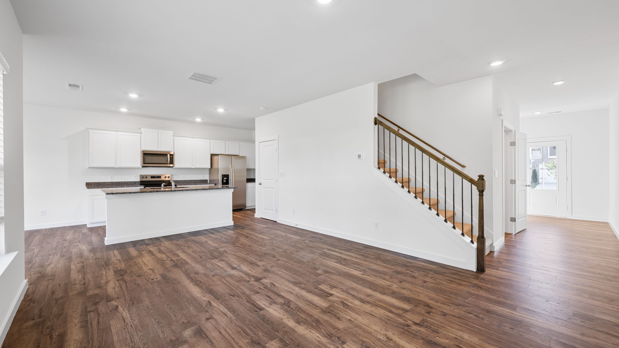 Open concept living area with double window