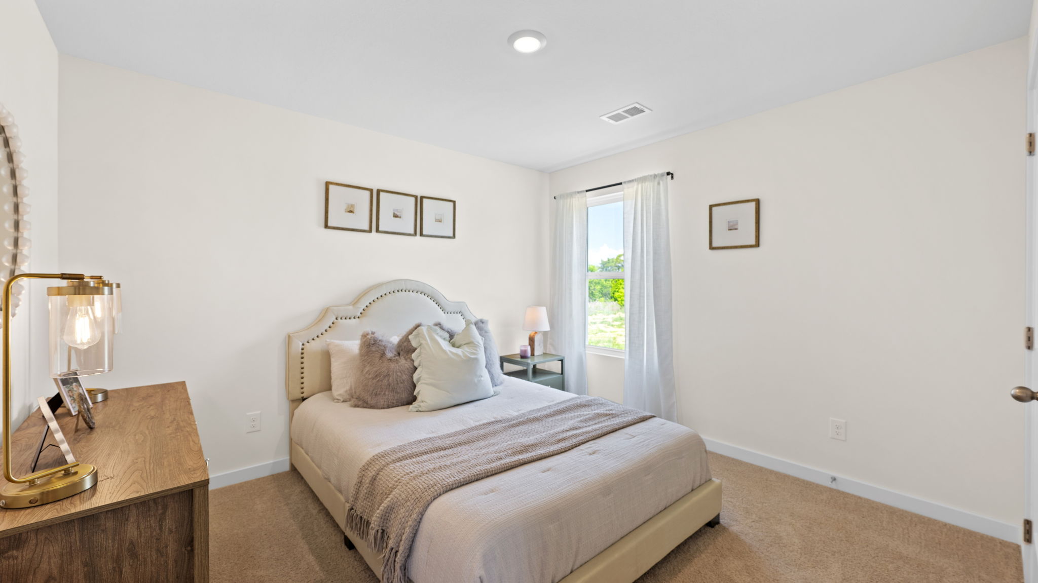 bedroom with single window and walk-in closet