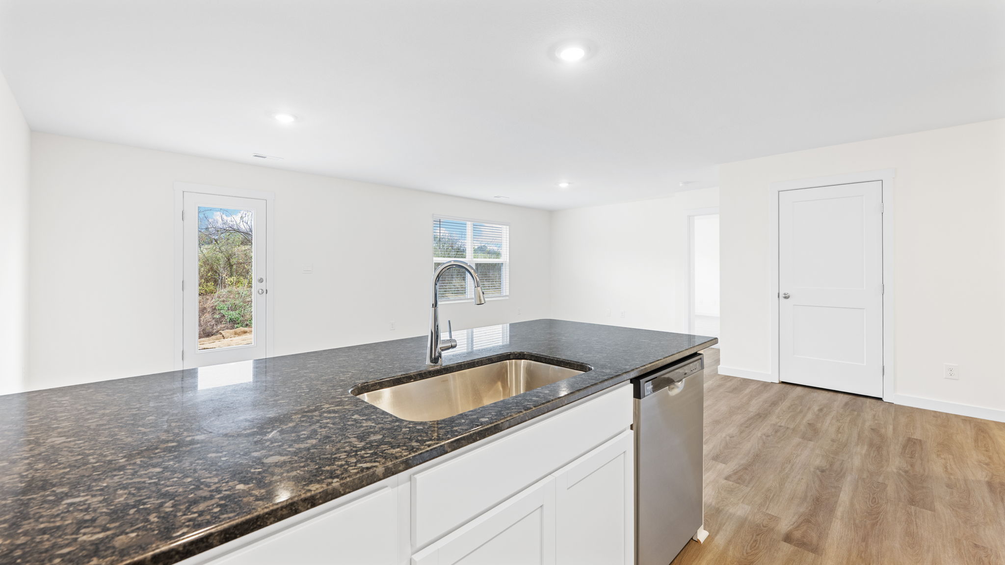kitchen with walk-in pantry and stainless steel appliances