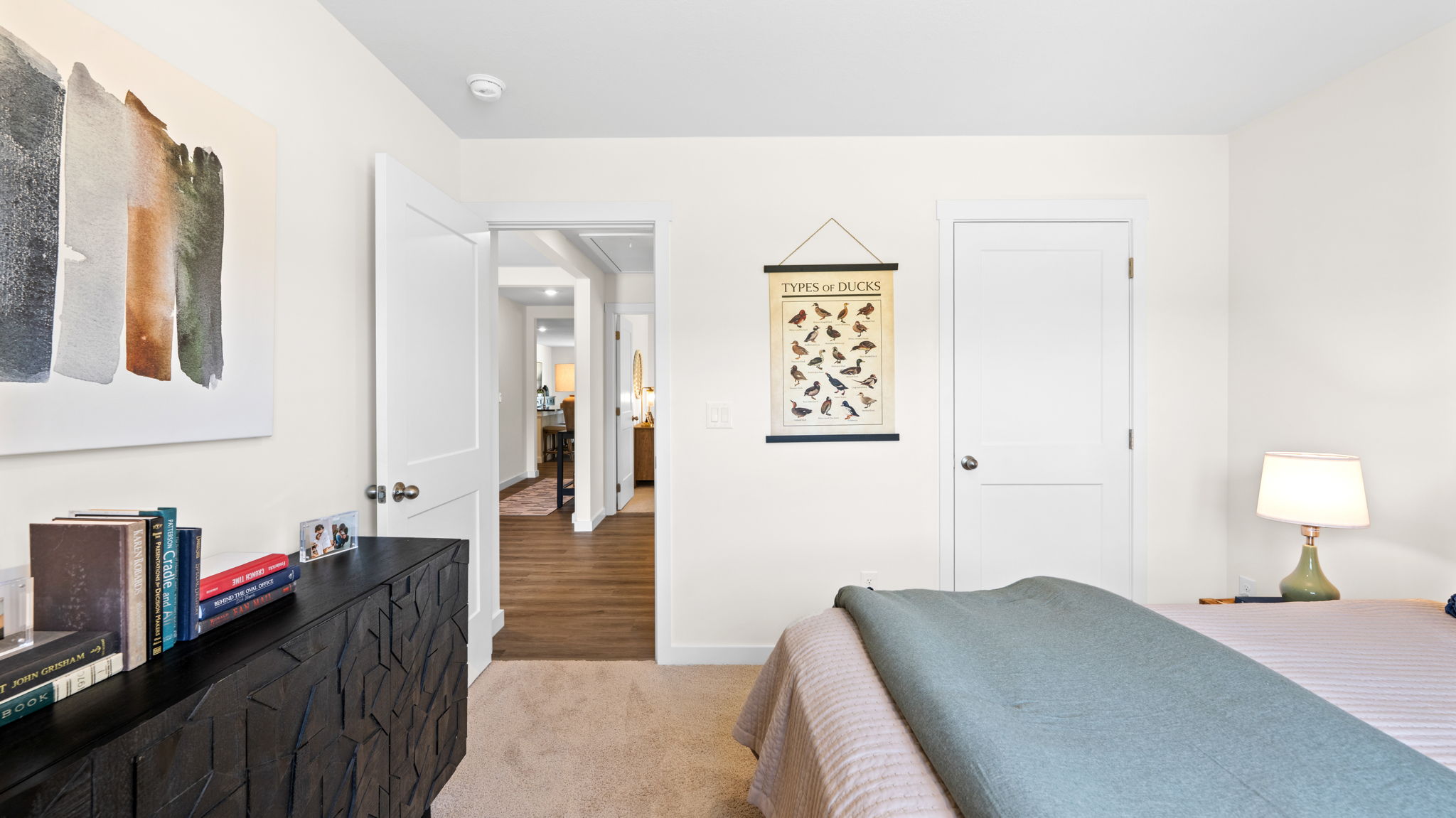 bedroom with double window and walk-in closet