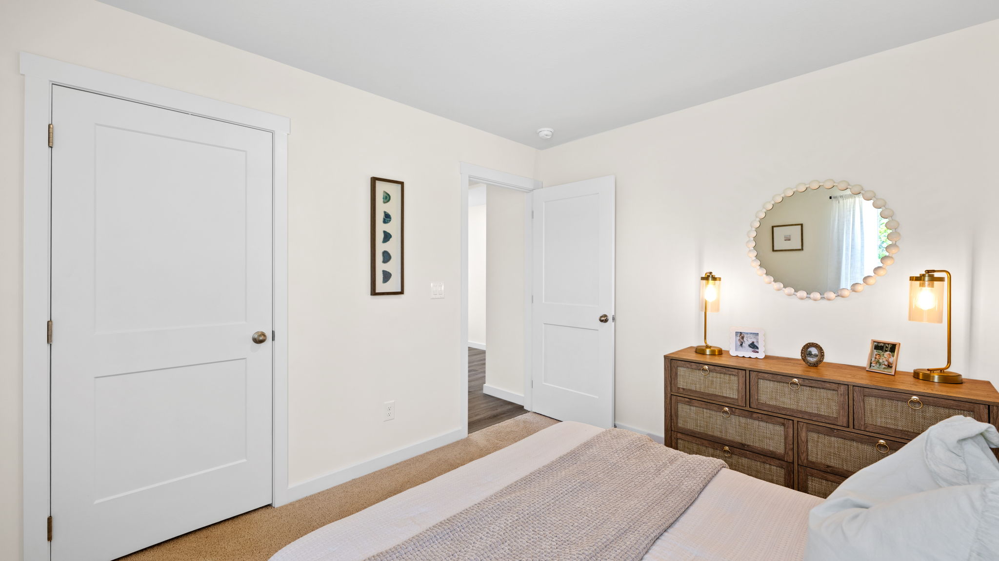bedroom with single window and walk-in closet