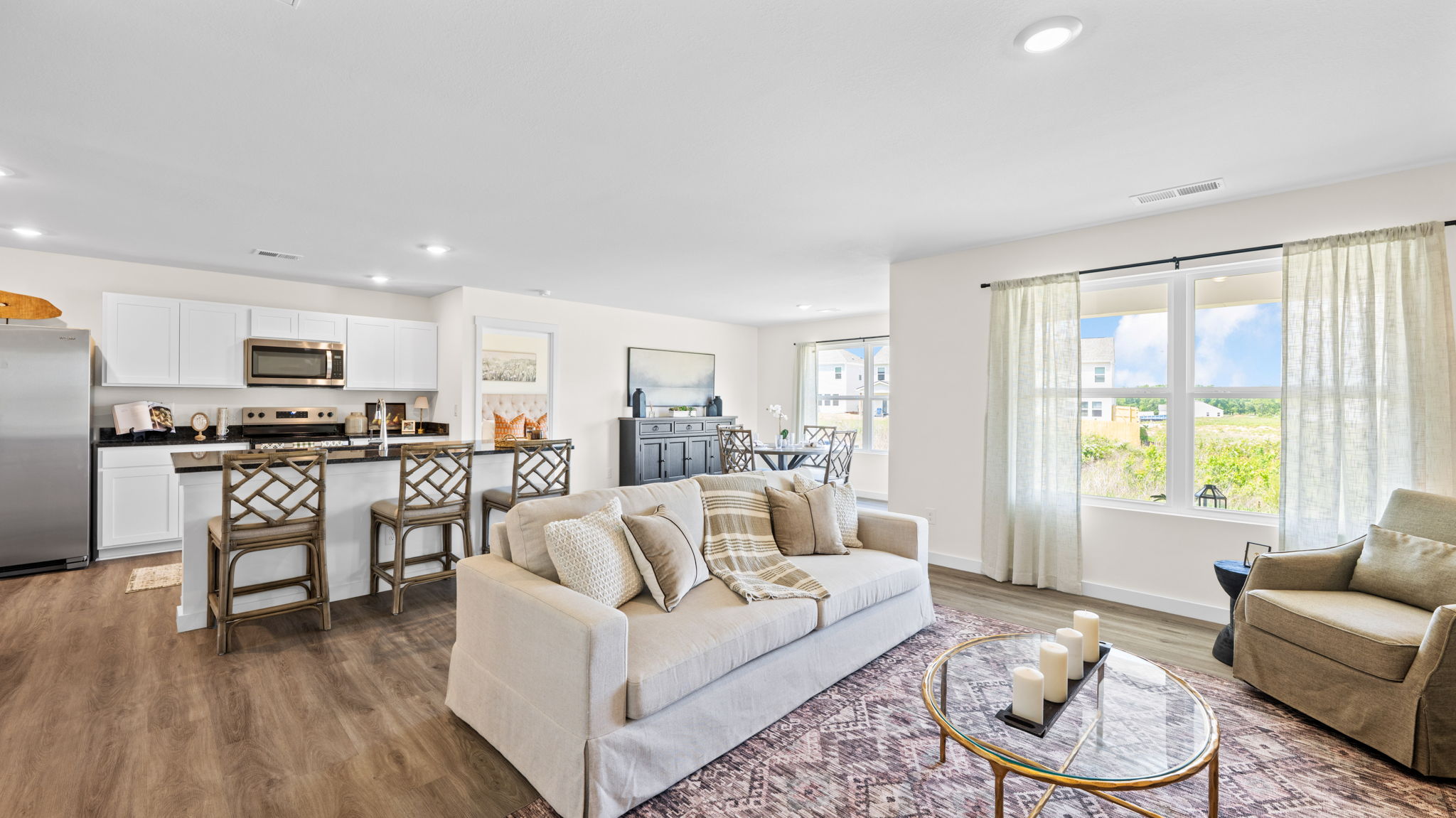 open concept living room with double window
