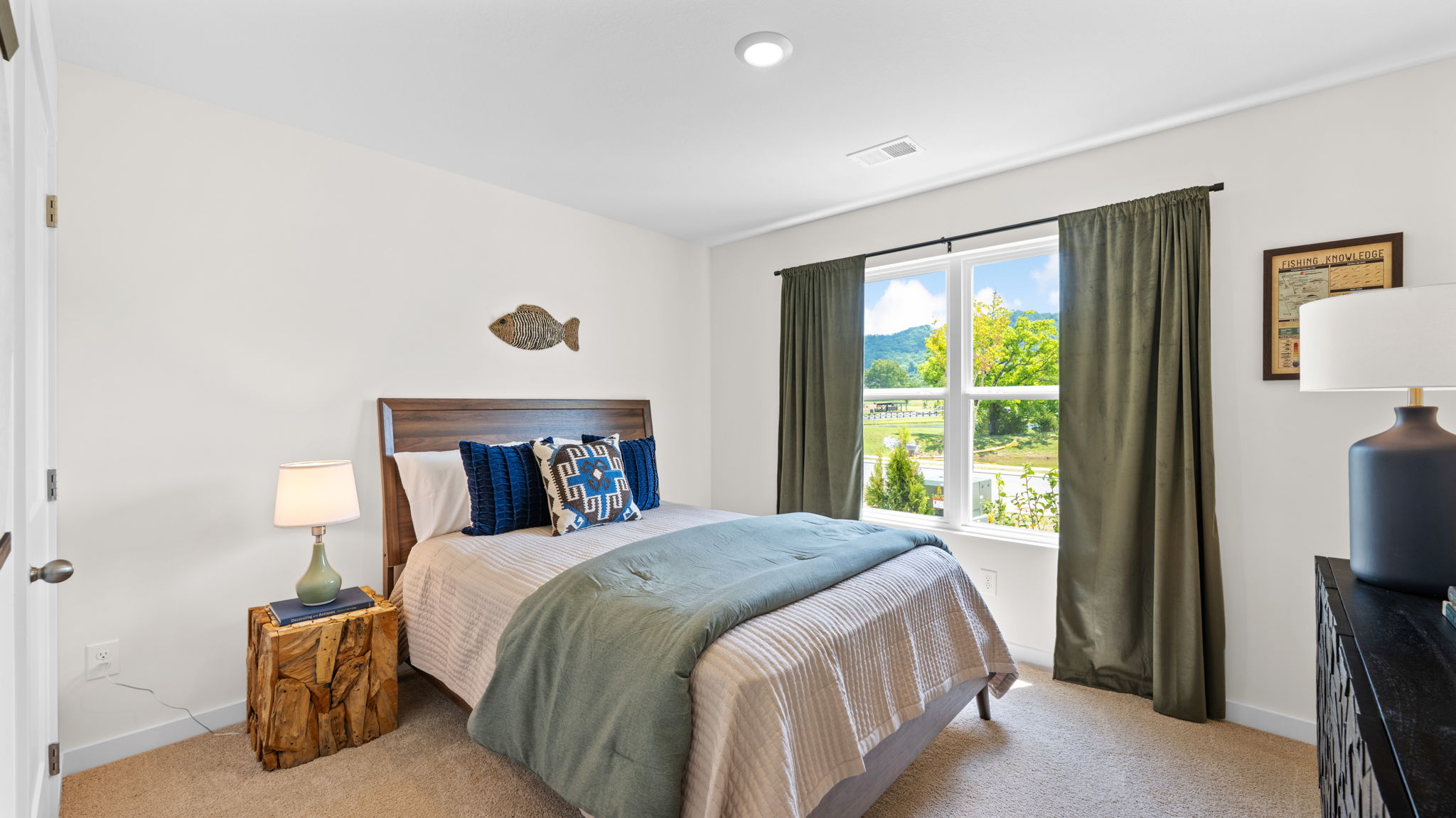 bedroom with double window and walk-in closet