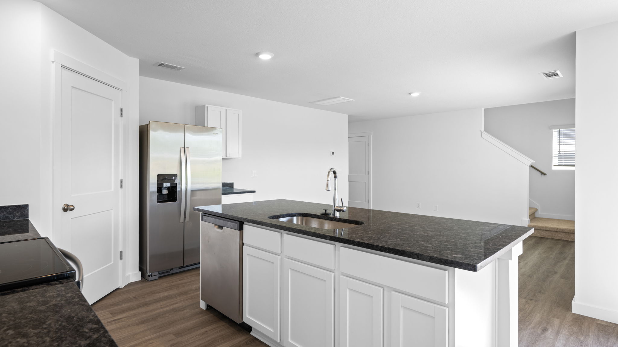 kitchen with large island and stainless steel appliances