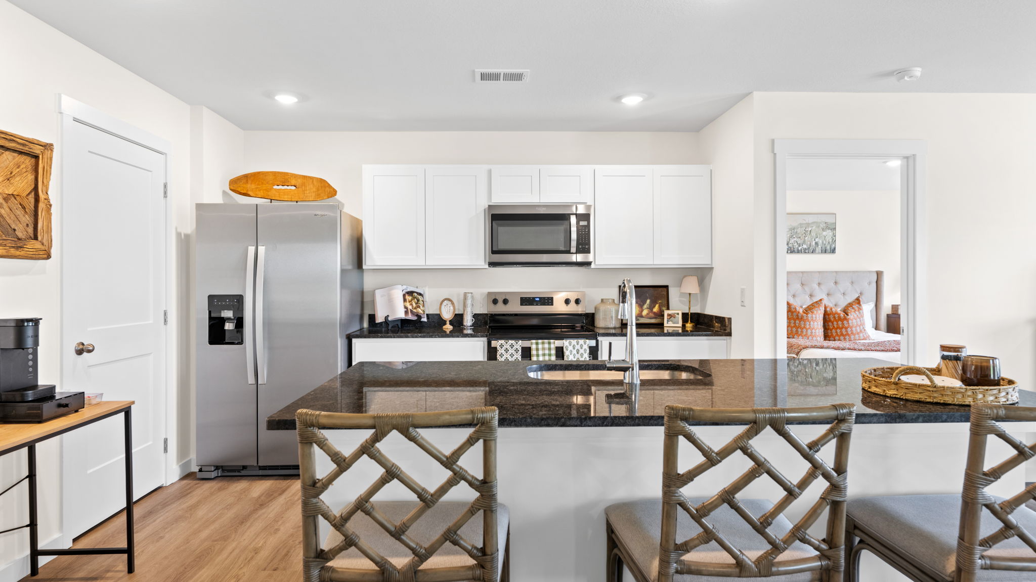open concept kitchen with large island and stainless steel appliances
