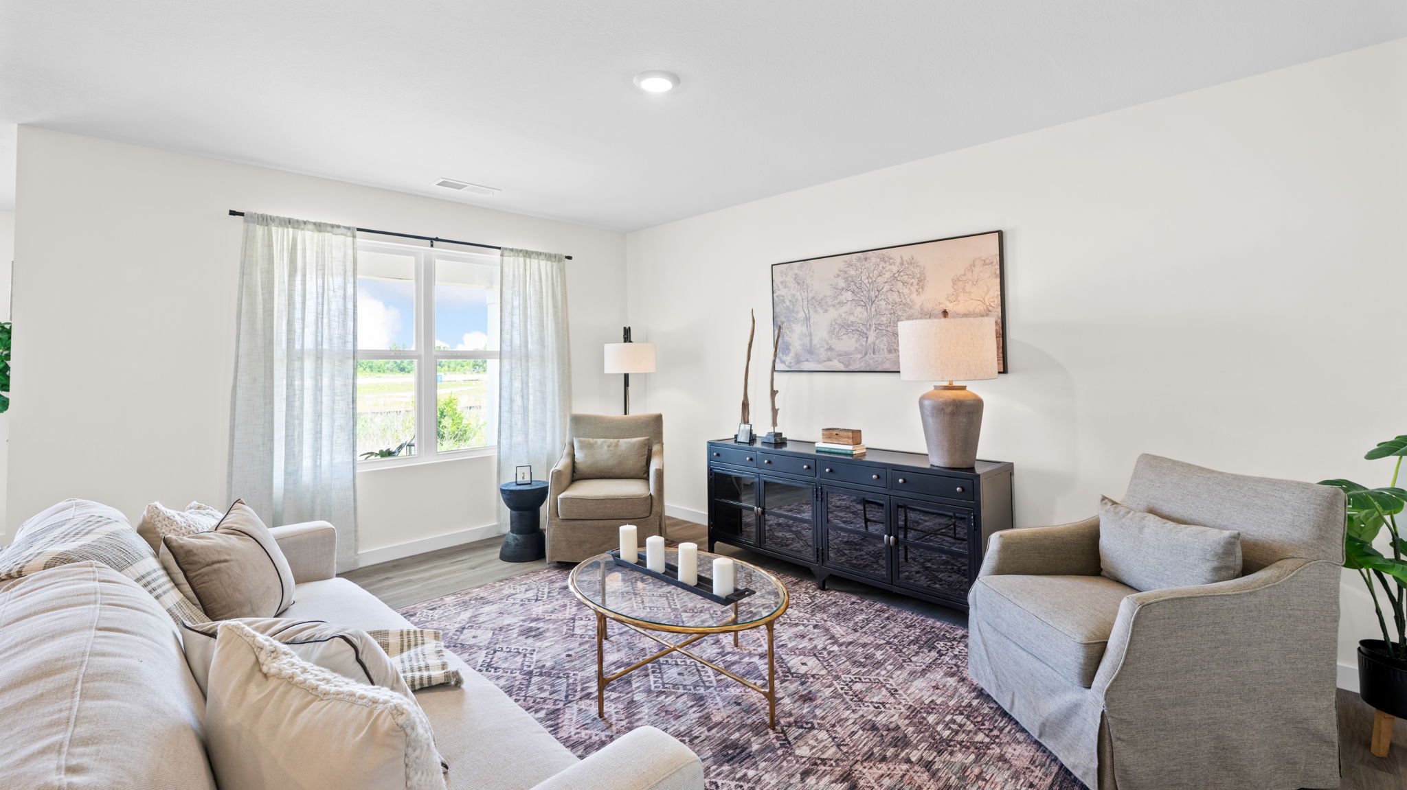 open concept living room with double window