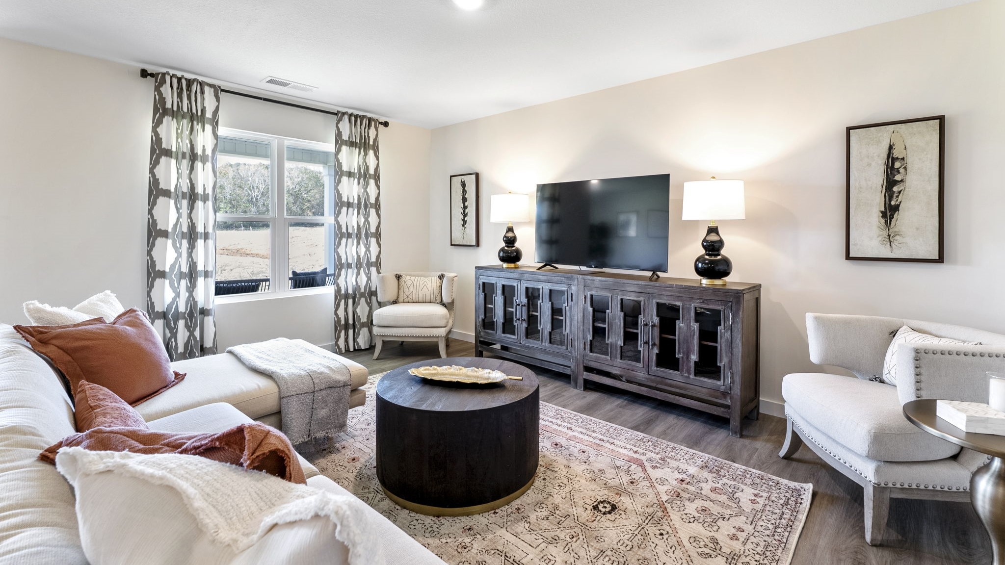 open concept living room with double window