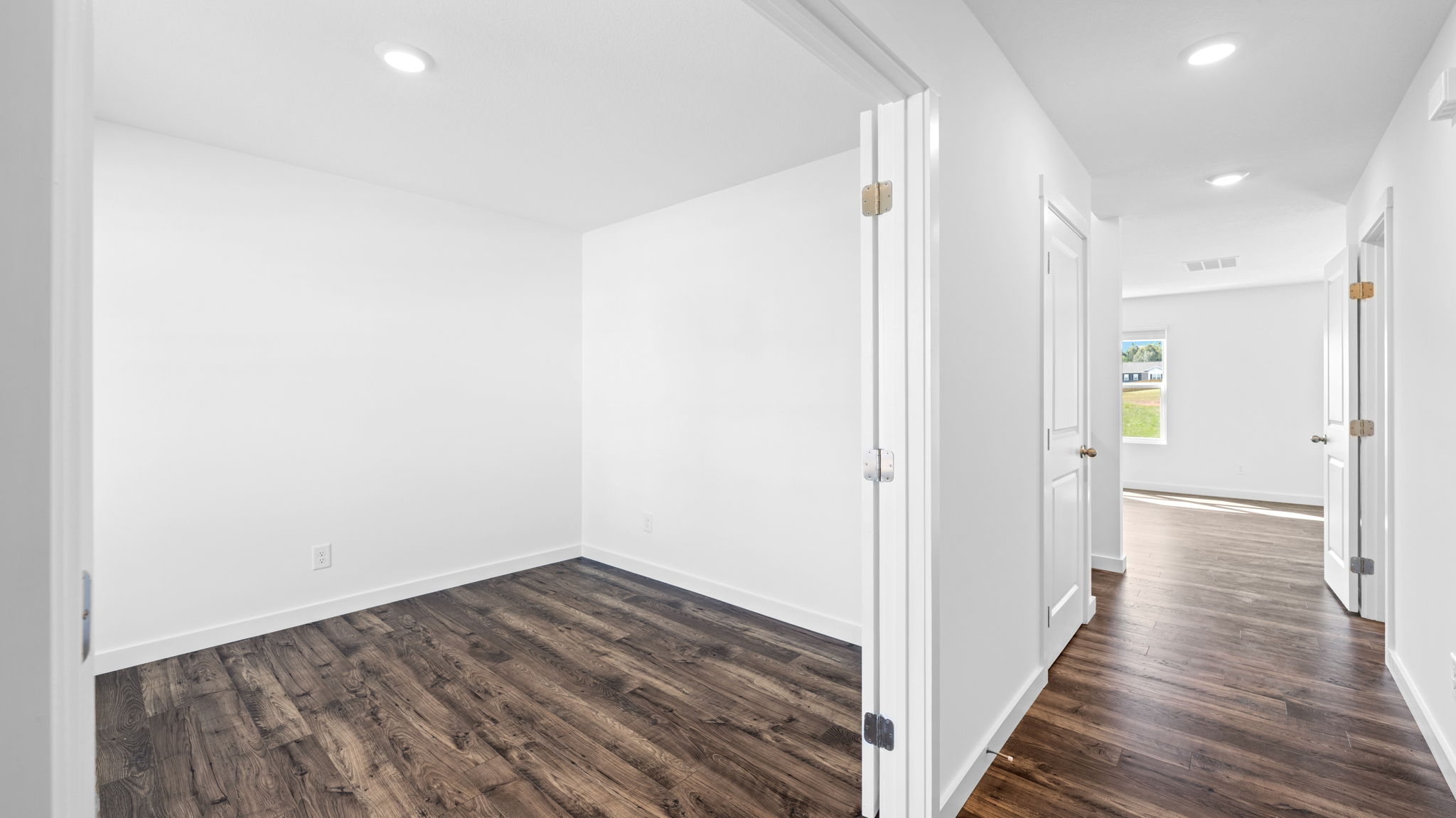 entryway hallway with office to the left