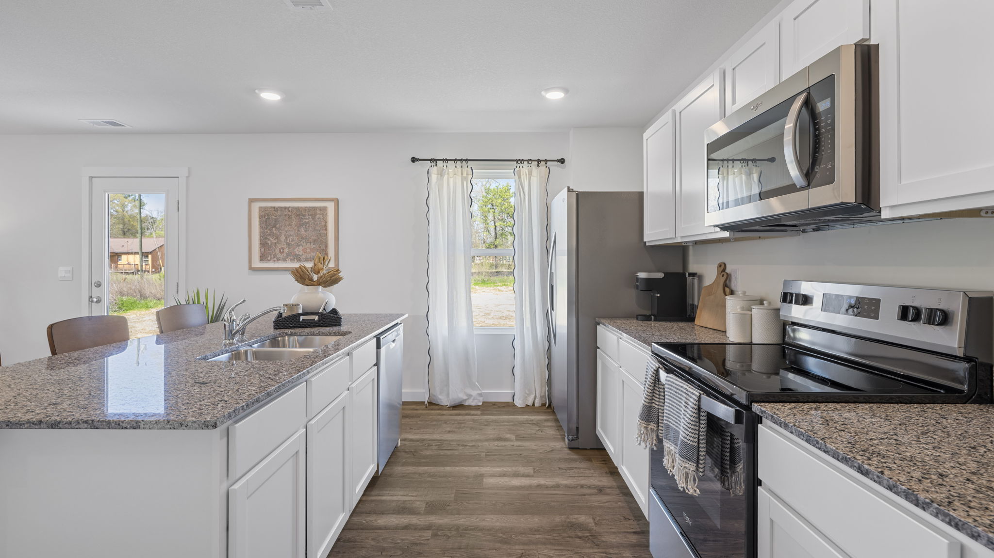 kitchen with large island and stainless steel appliances