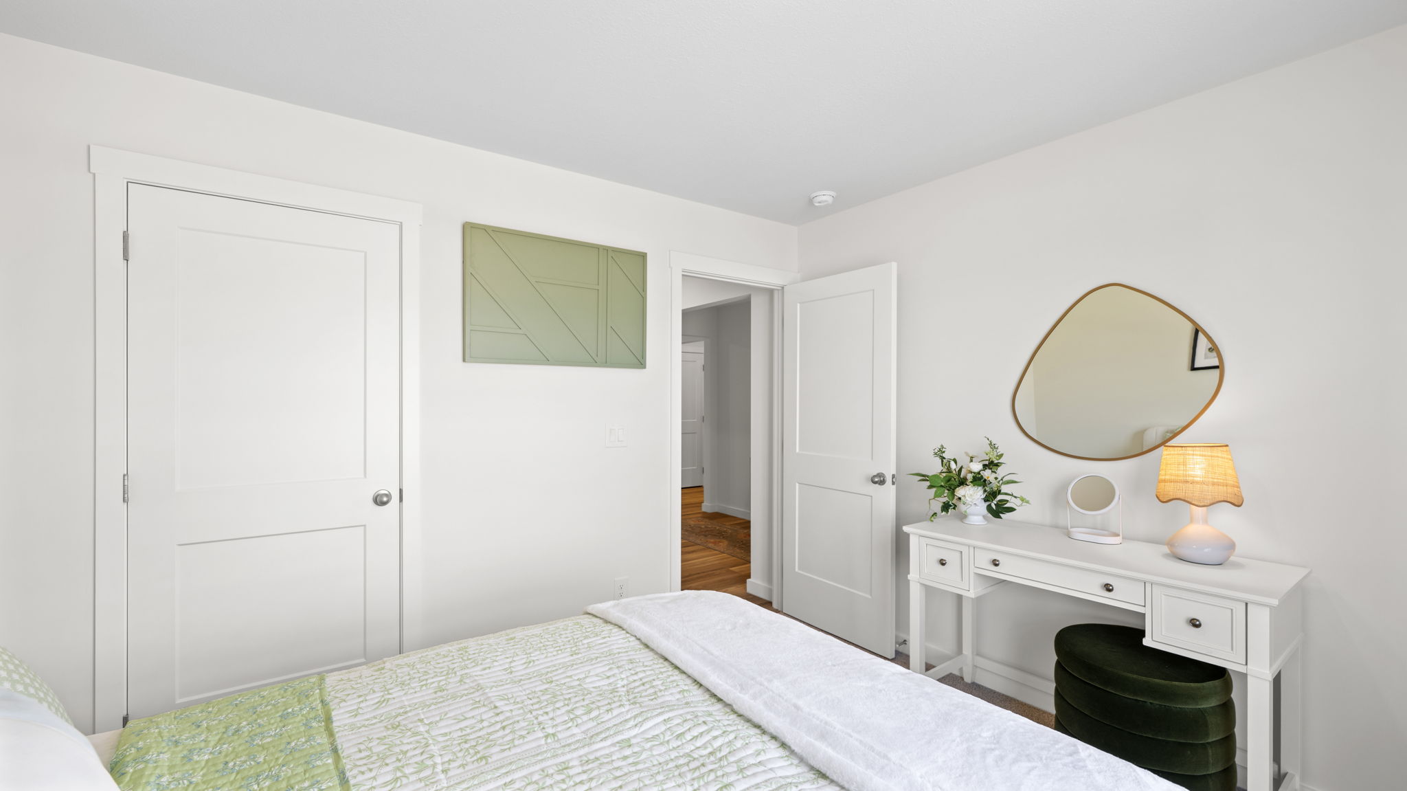 bedroom with double window and closet