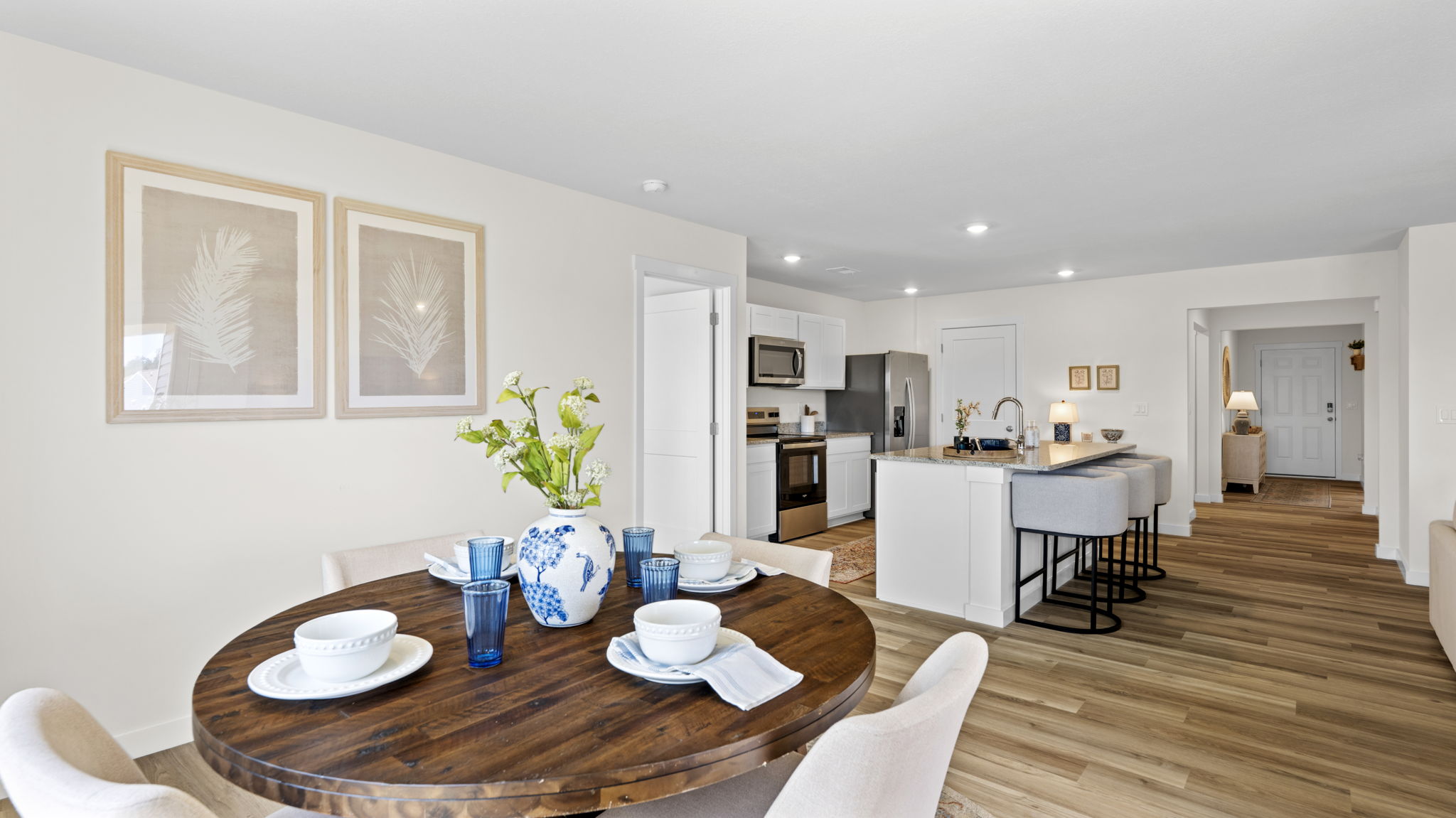 informal dining with double window and back patio door
