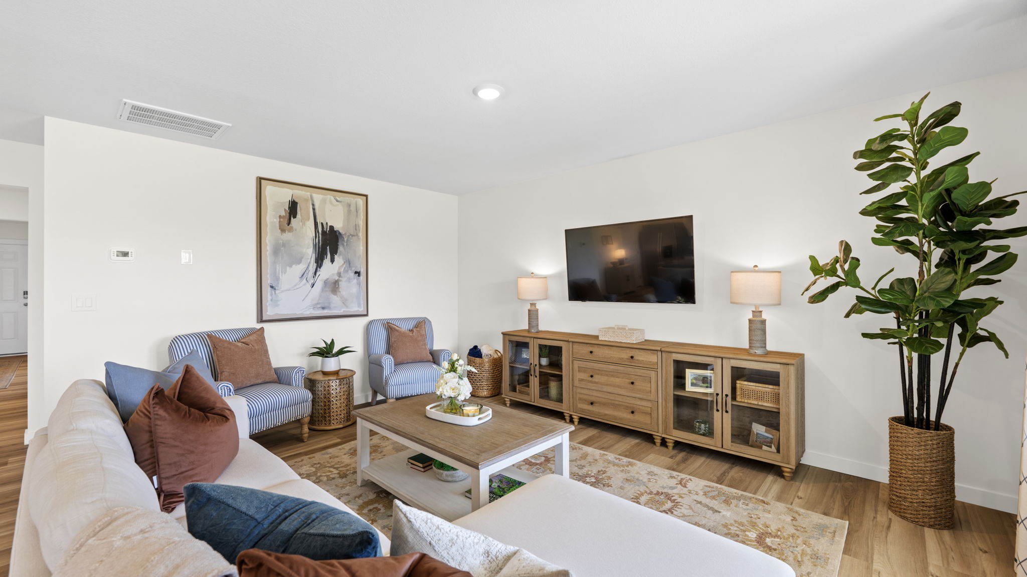 open concept living area with double window