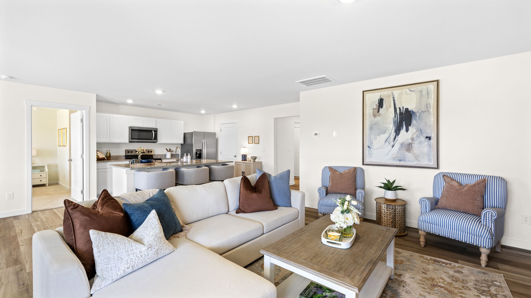 open concept living area with double window