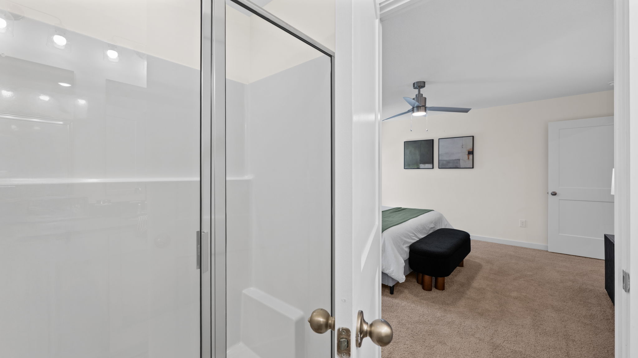 primary bedroom en suite bathroom with walk in shower