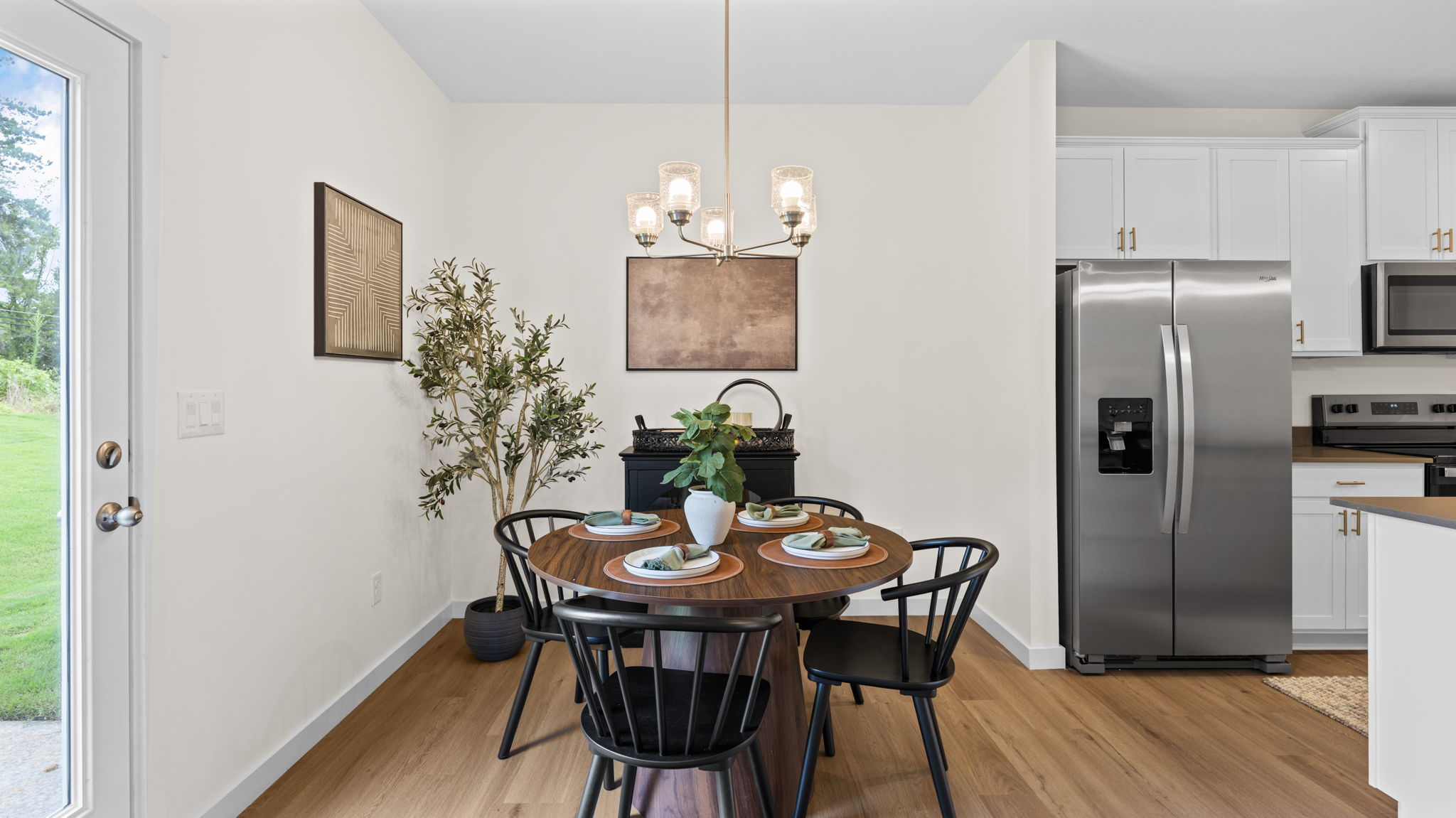 open concept kitchen with dining table