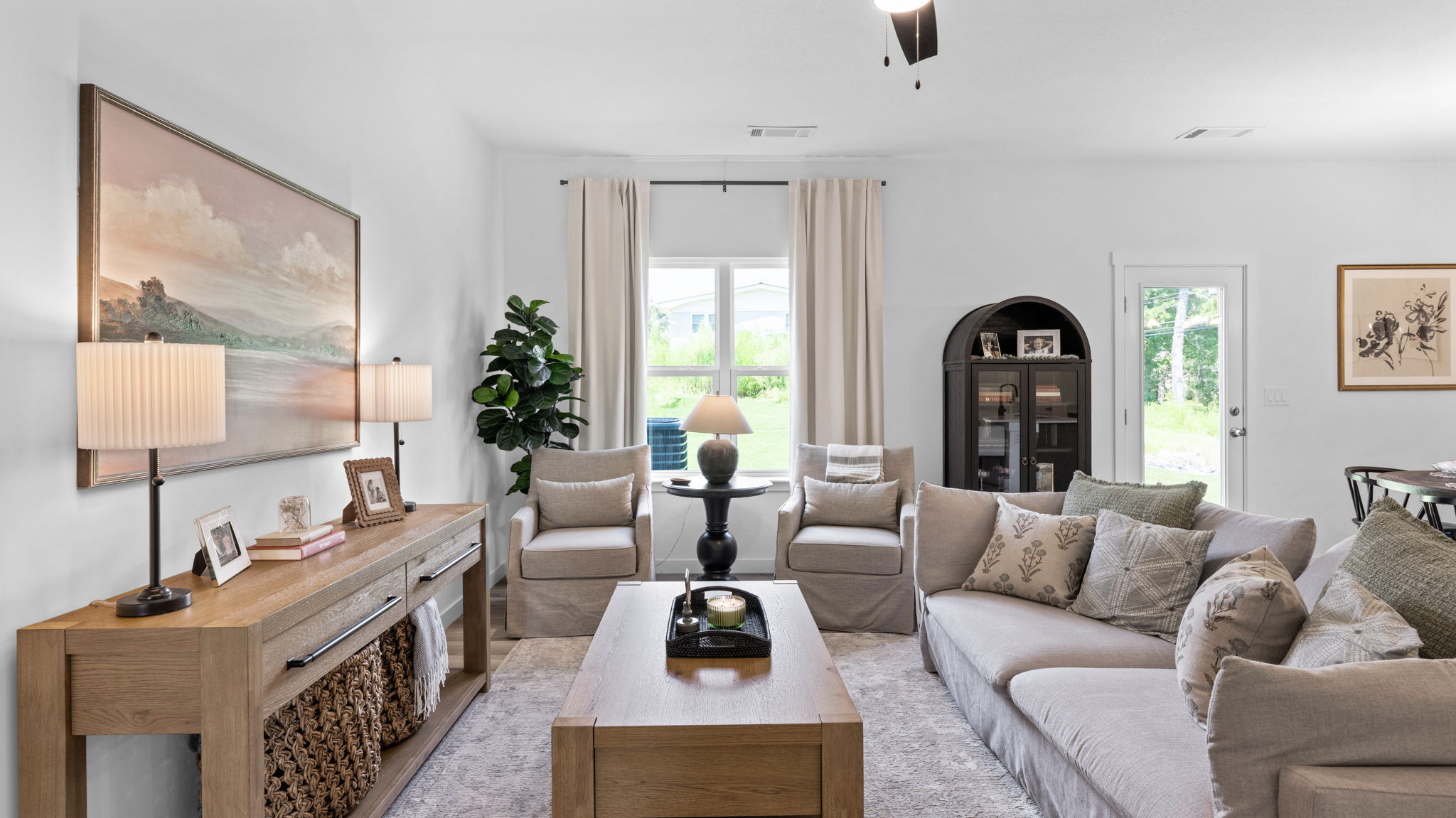 open concept living room with double windows