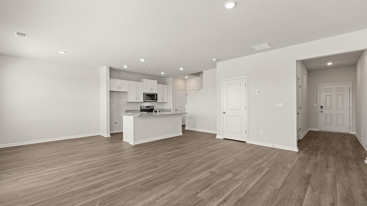 open concept living area facing kitchen