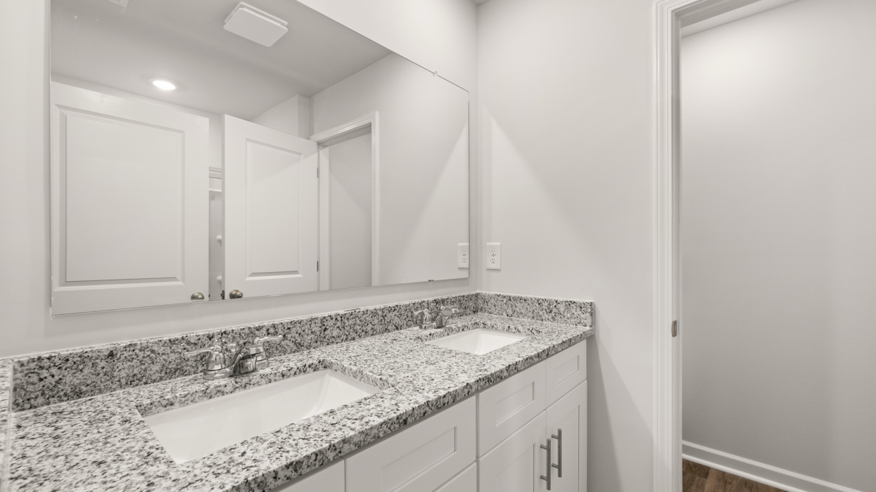 primary bathroom with double vanity