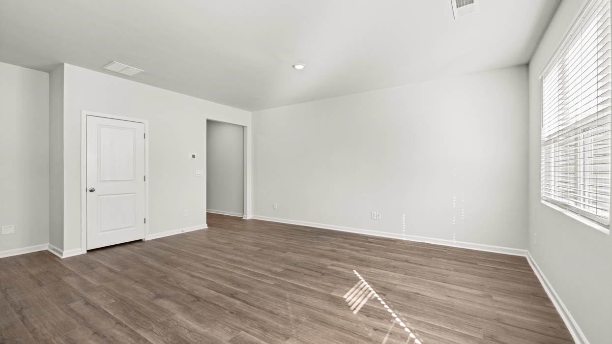 open concept living room with double window