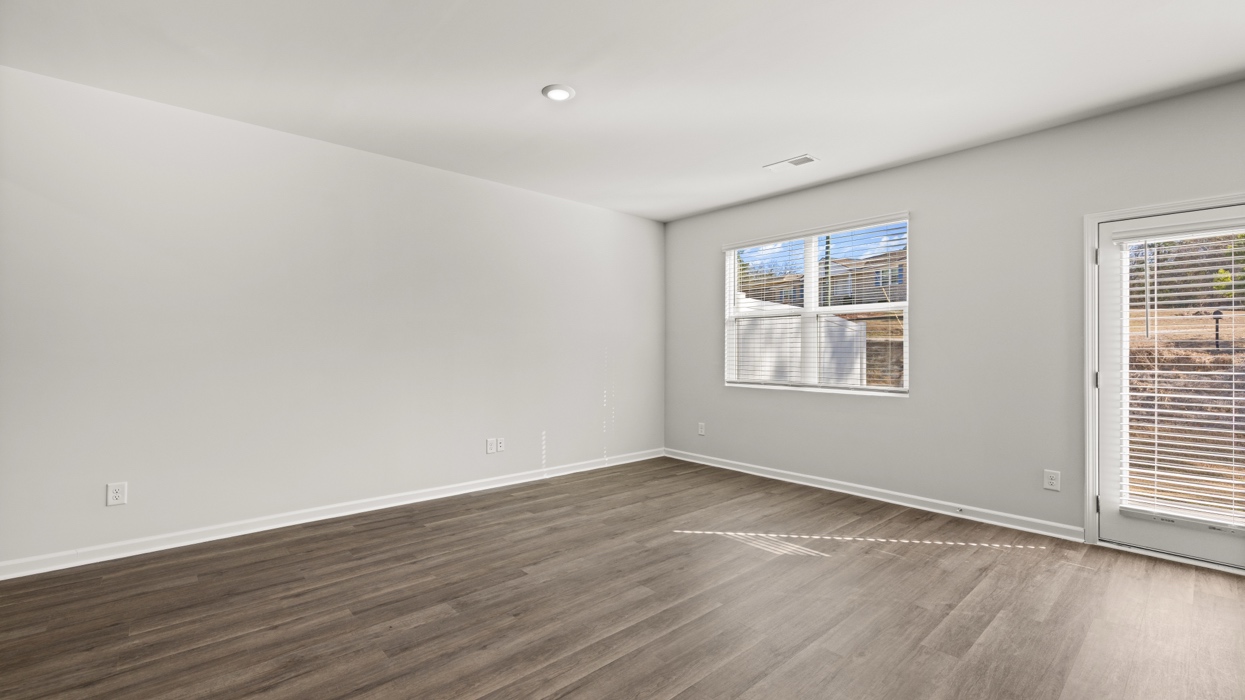 open concept living room with double window
