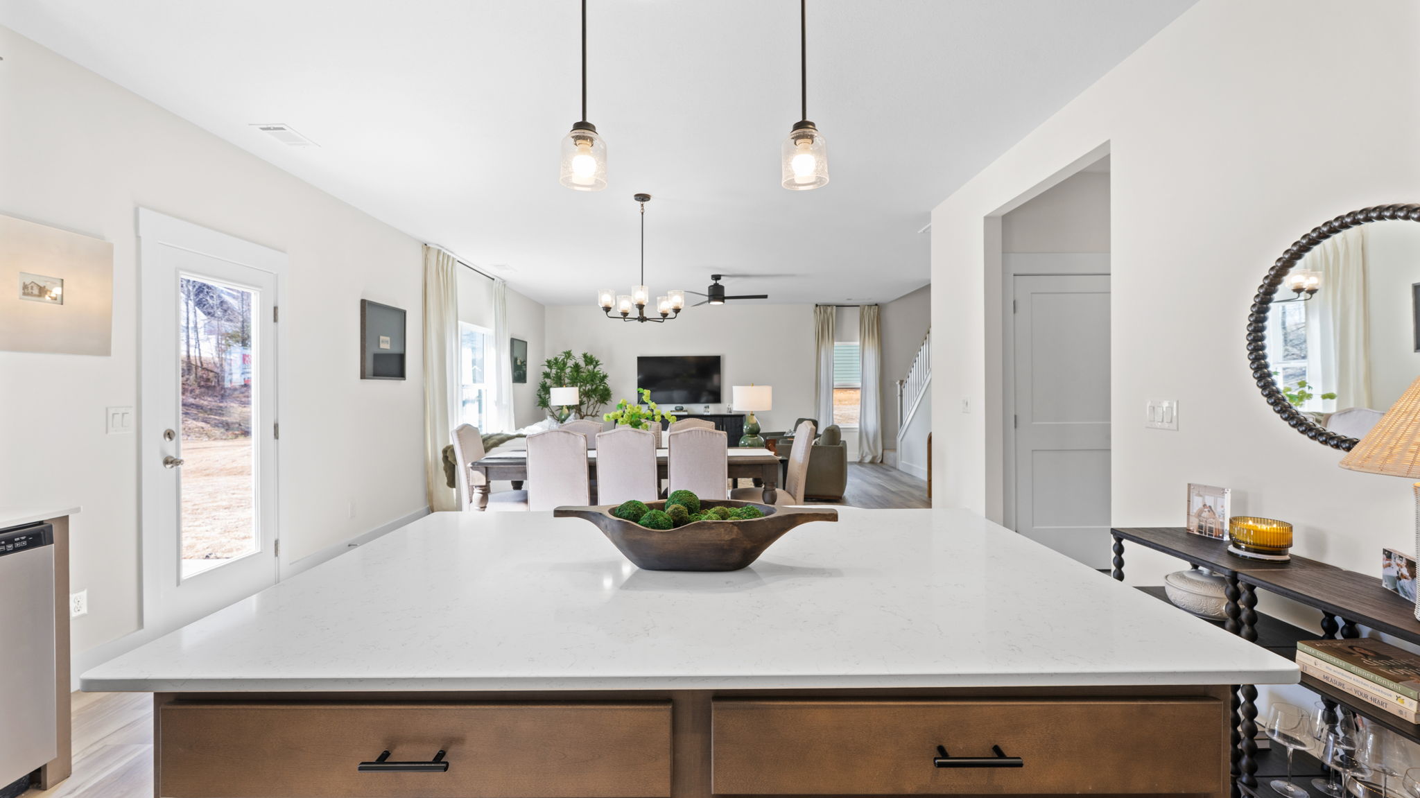 open concept kitchen with large island and stainless steel appliances