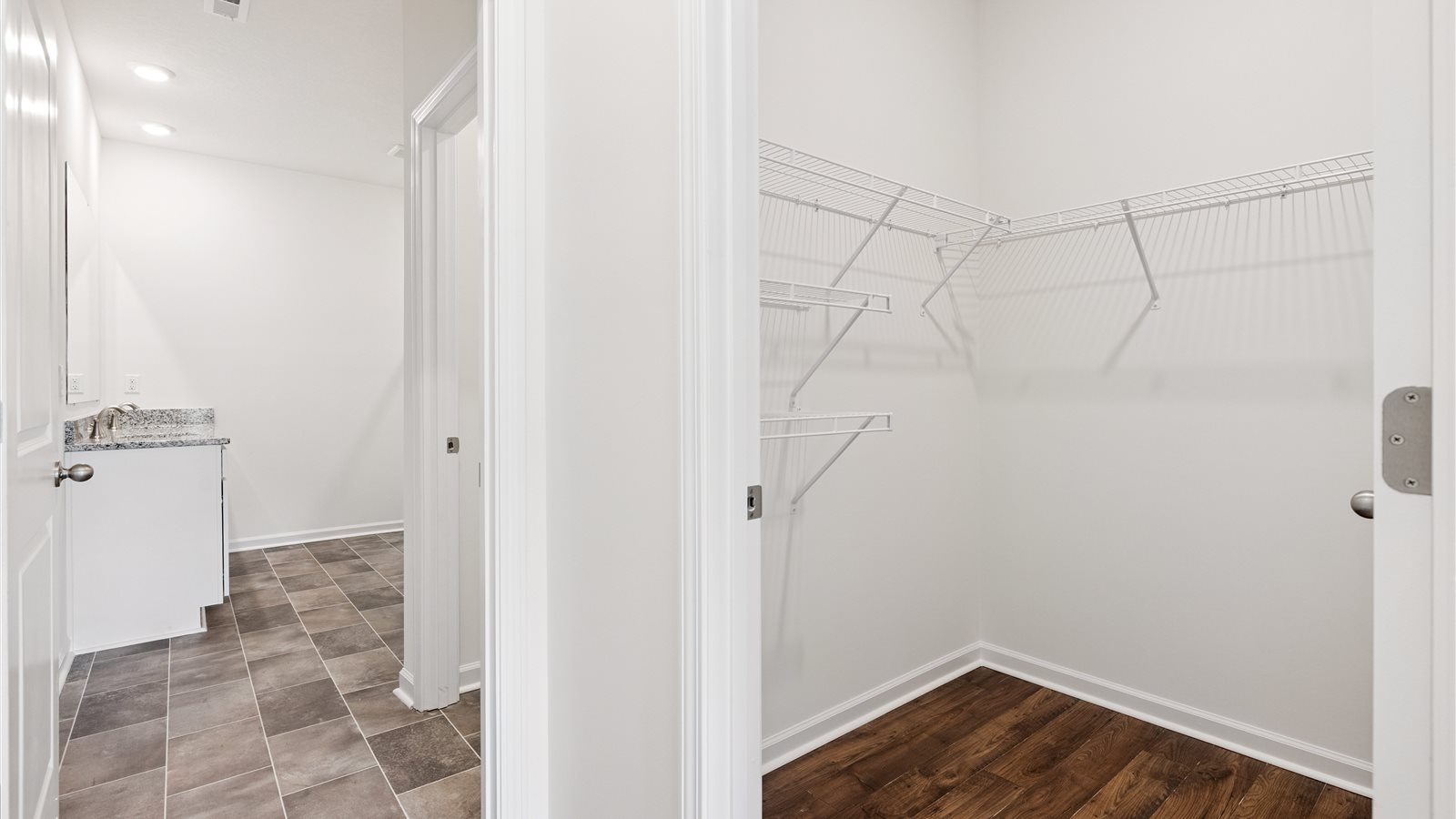 Primary bathroom with double vanity and walk-in shower