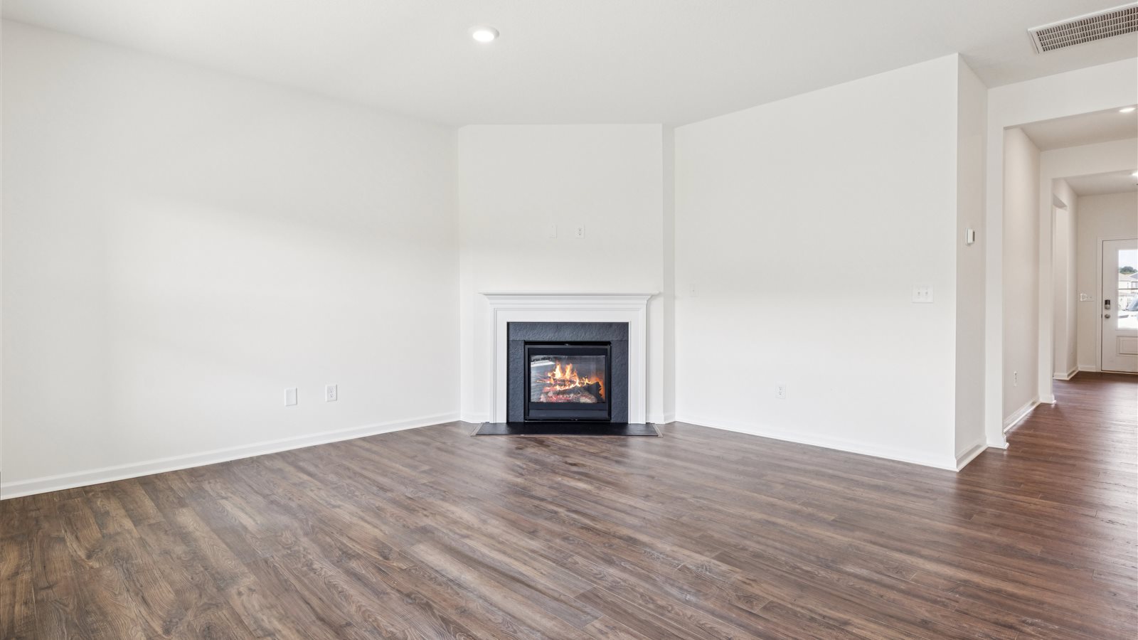 Open concept living, dining, and kitchen space