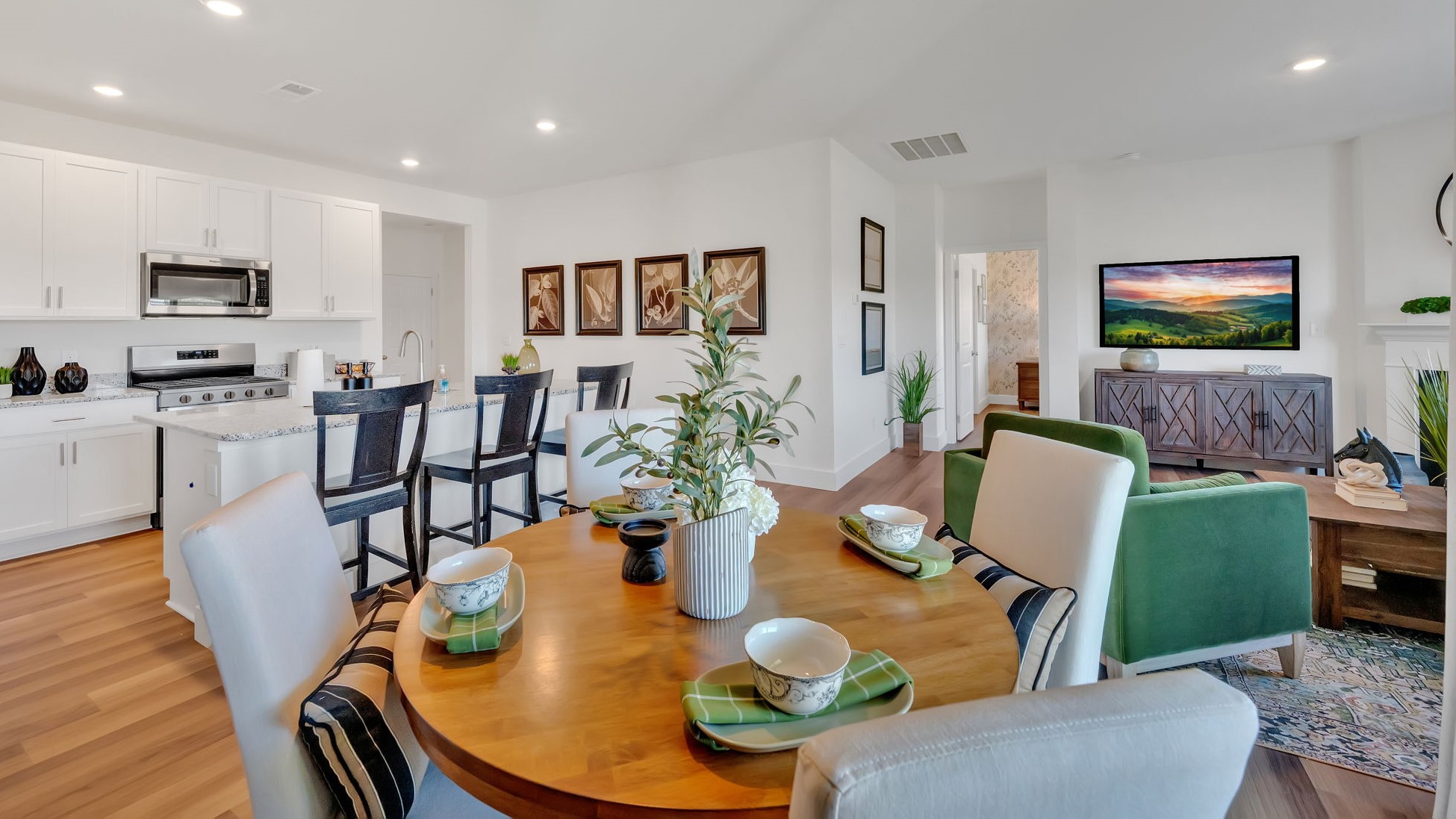 Open concept living, dining, and kitchen space