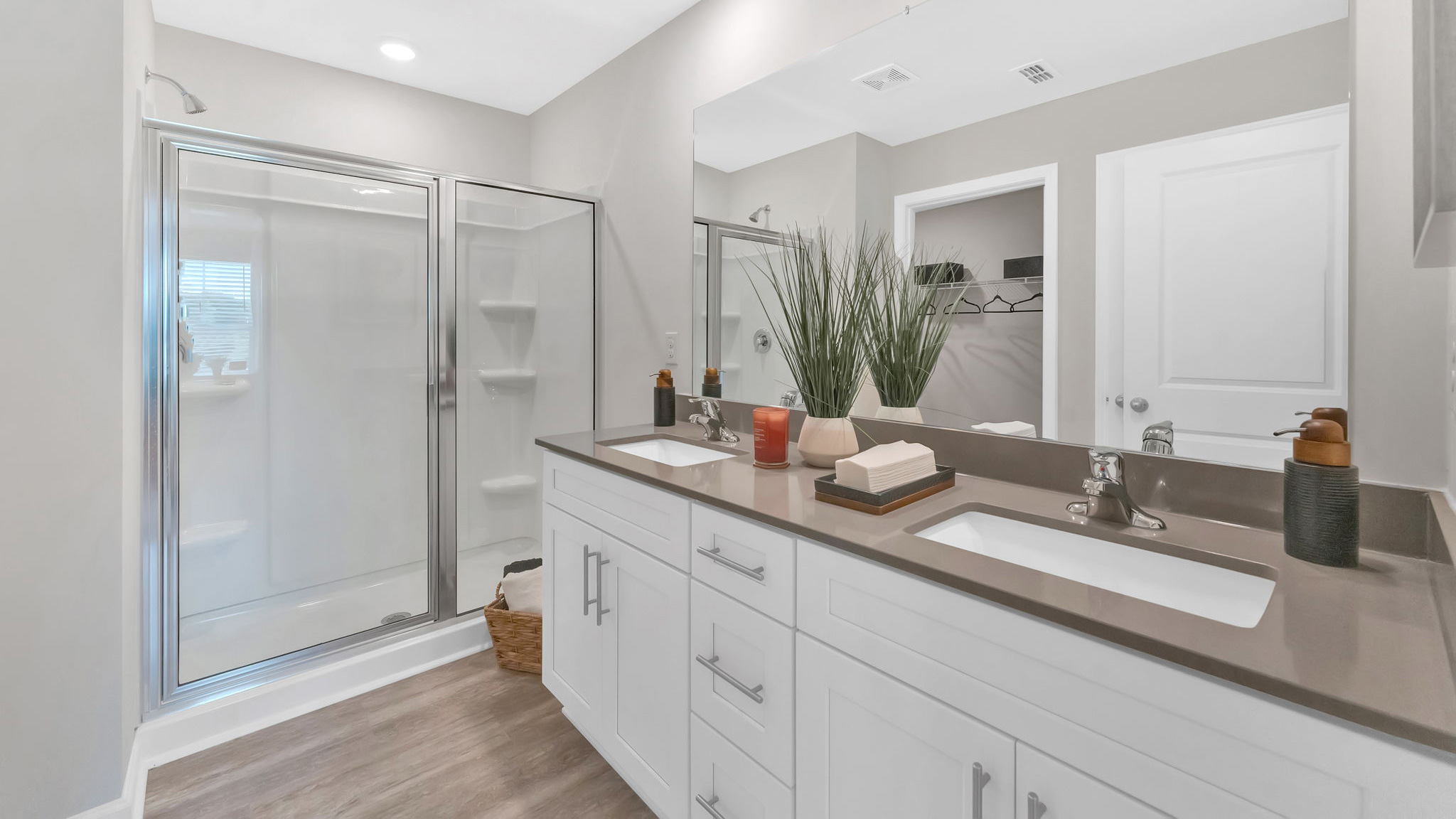 Private attached primary bathroom with built in vanity