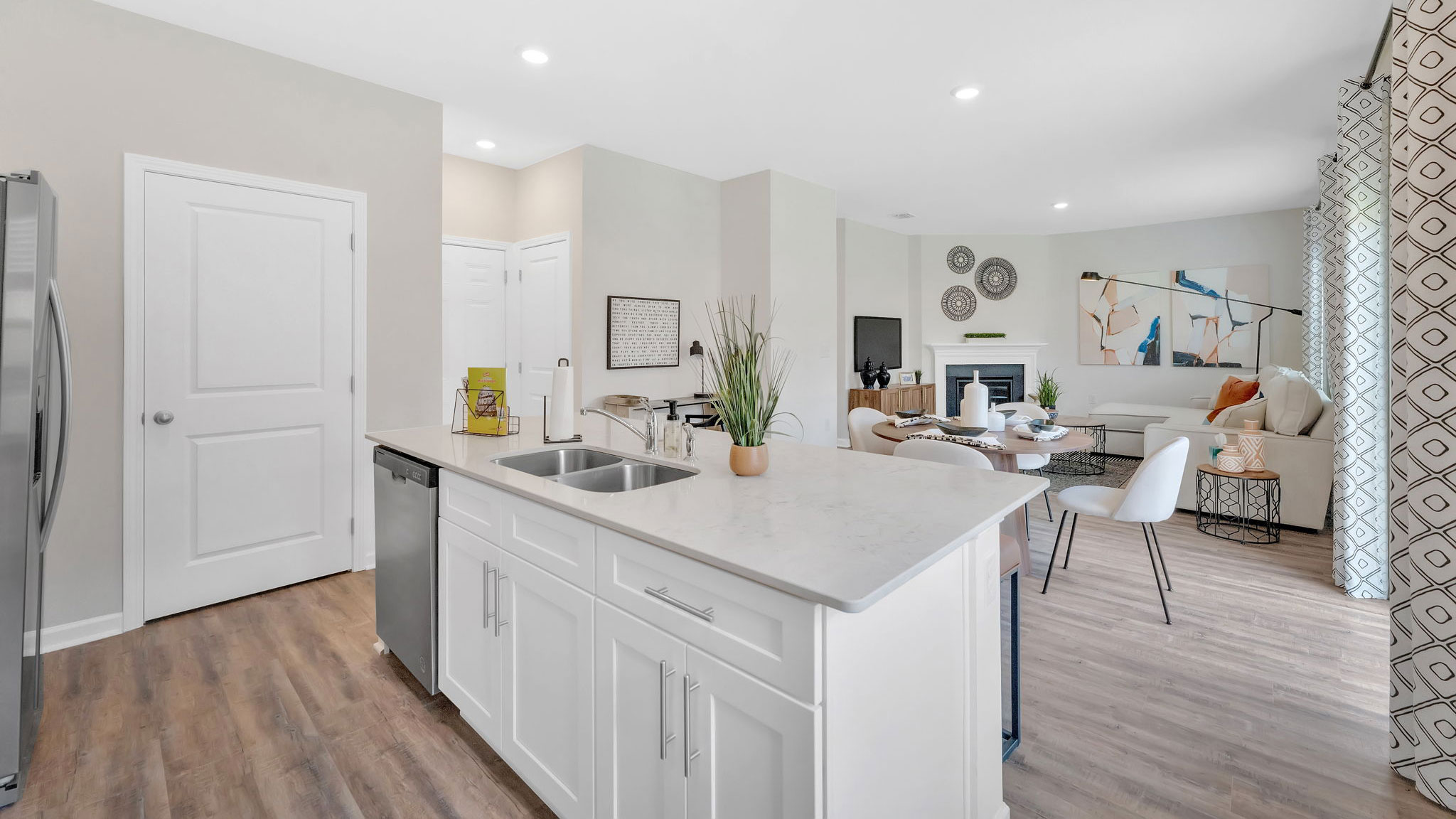 Spacious open concept kitchen with island and counter prep space